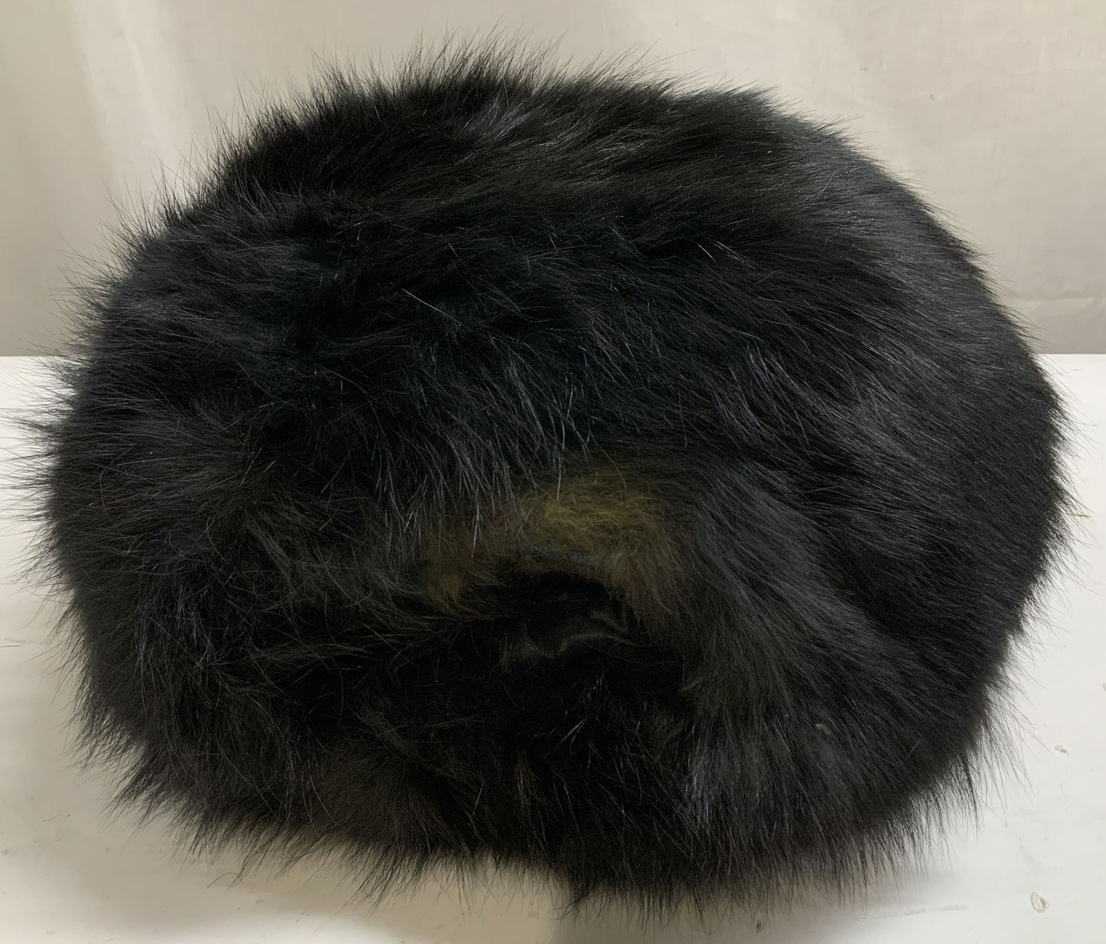 Vntg Black Fur Muff W Zipper Pocket: Vintage black fur muff features an interior zippered pocket & braided black cord. No visible signature or markings. Surface wear consistent to age, use & exposure. Measurements: length 10.5in x