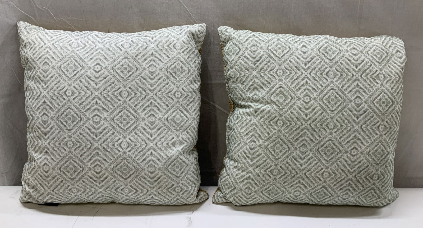 Pair Nautica Home Double Sided Deco Pillows: Lot includes, pair of Nautica Home decorative pillows featuring a green diamond pattern style. Backside features a textured woven style. Possible synthetic material. Signed & marked. Reads, NAUTICA HO
