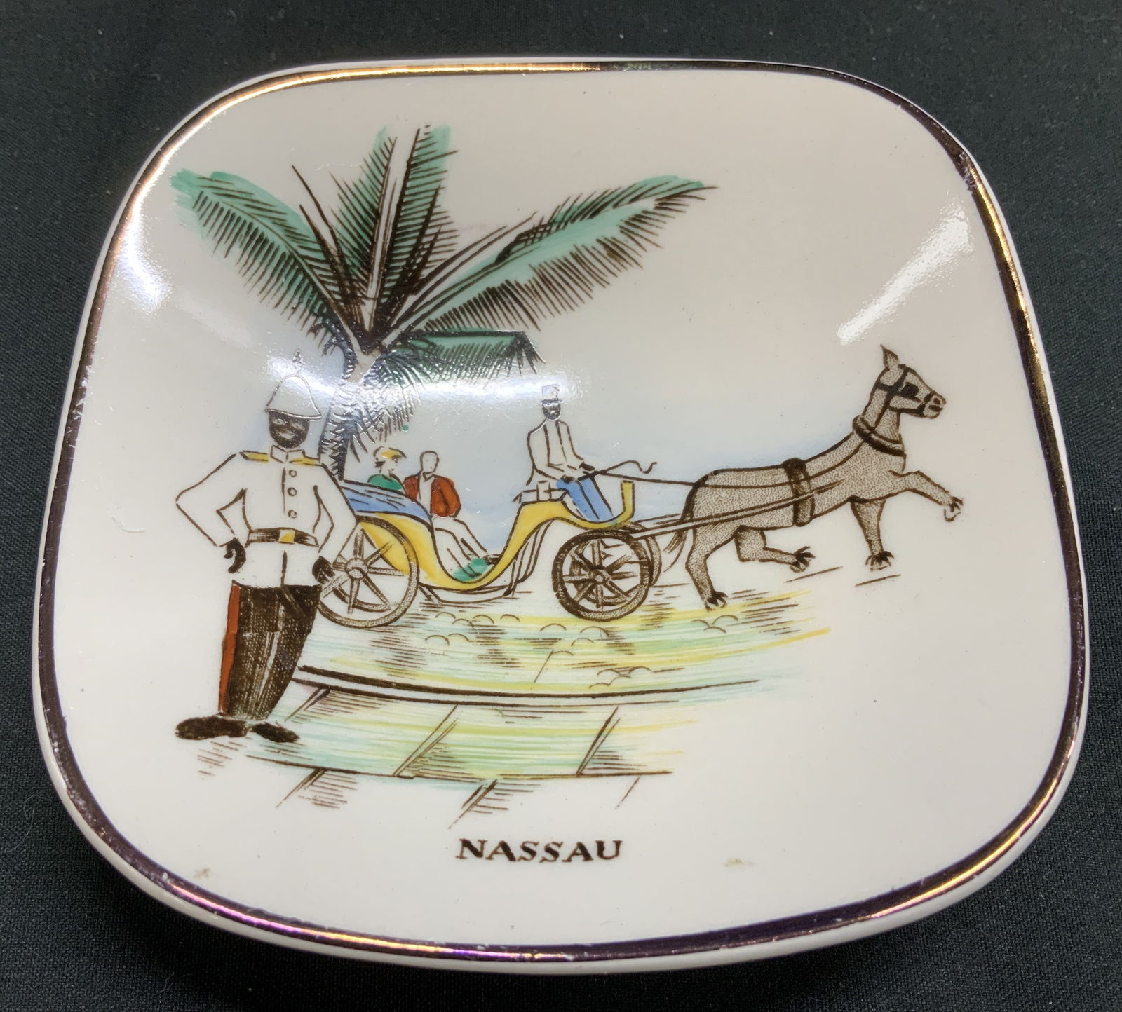 Vtg Grays Pottery Nassau Souvenir Trnk Dish ENG: Vintage Grays Pottery Nassau souvenir trinket dish. Hand painted illustration of a horse carriage & guards. Reads, NASSAU on front. Signed & marked on underside. Reads, GRAYS POTTERY MADE IN STOKE ON