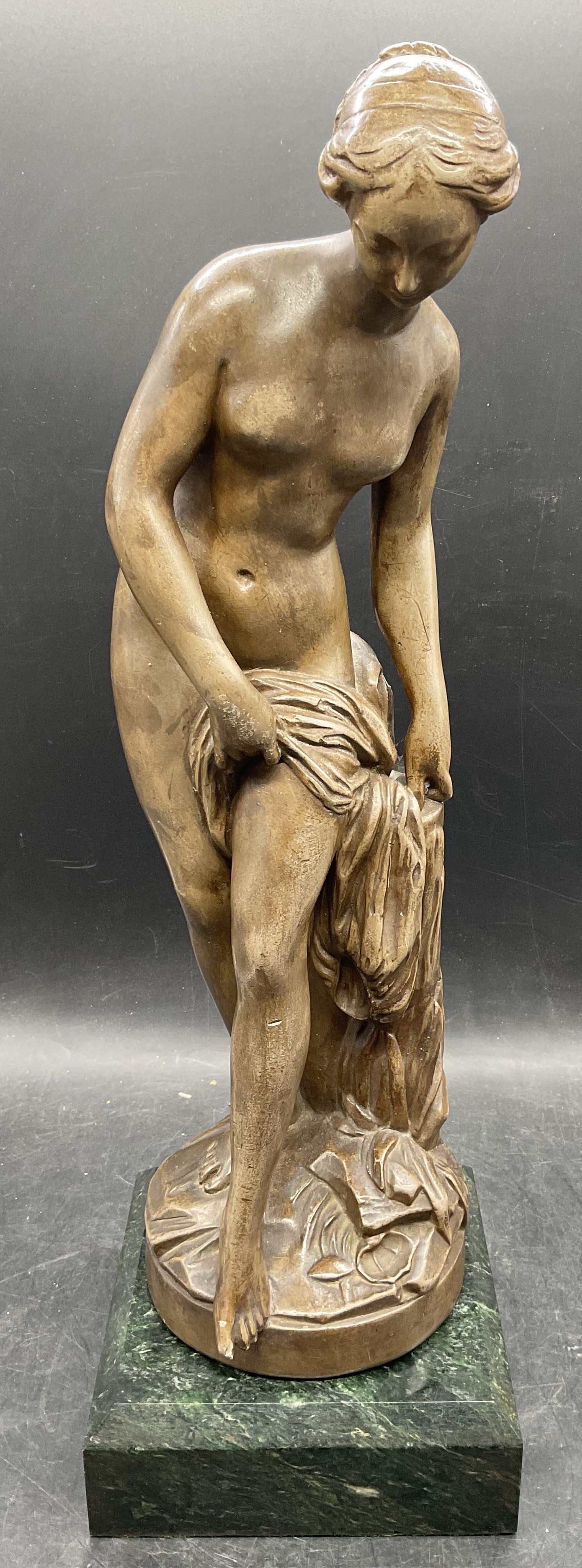 After Falconet La Baigneuse Sculpture w Plinth: Ceramic or plaster sculpture after Etienne Maurice Falconet (French, 1716-1791). La Baigneuse (The Bather) or Venus au Bain (Venus at the Bath). Nude woman with drape. Includes green marble plinth. Sc