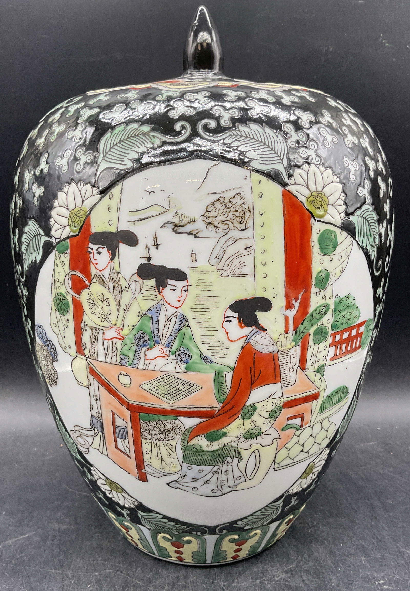 Sgn Chinese Famille Noire Porcelain Ginger Jar: Signed Chinese Famille Noire porcelain ginger jar. Hand painted in palette of black, red, and green. Tradition Chinese figure scenes and ornate floral designs. Measures approx 8 x 12.5 inches.