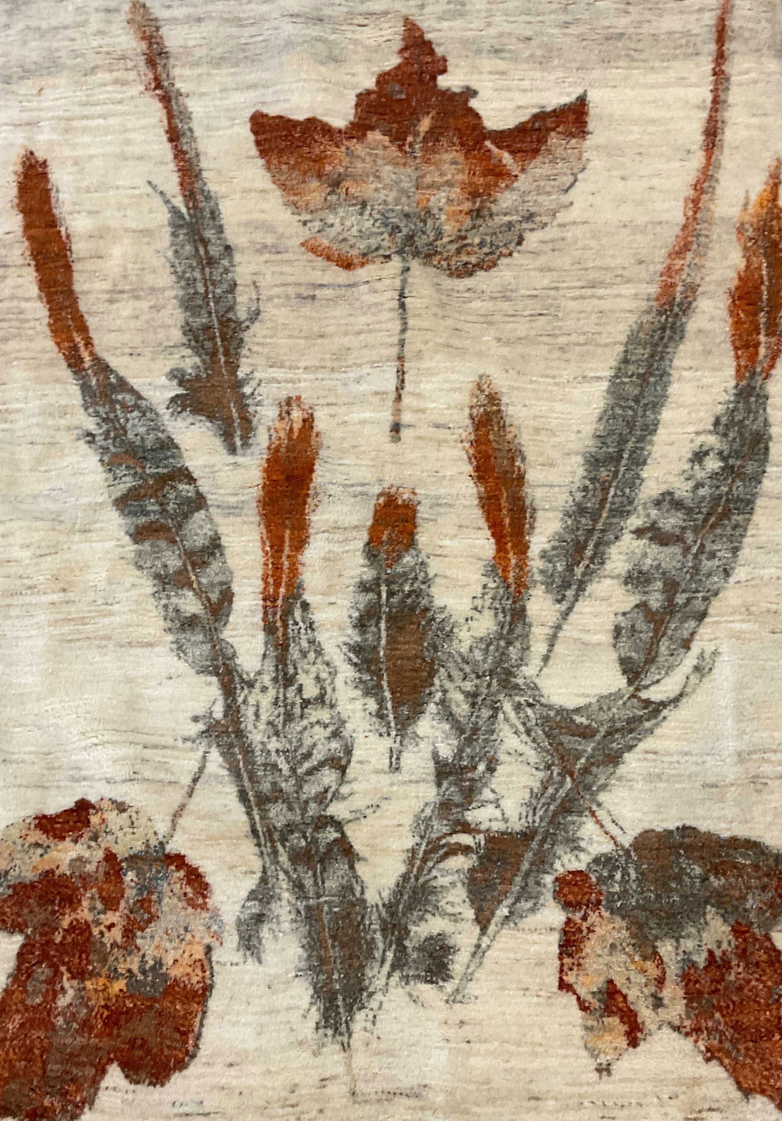 Vintage Persian Hand Tufted Wool Leaf Area Rug 64i: Vintage Persian hand tufted wool area rug. Label in Persian on underside. Leaf and feather pattern in white and orange. Measures approx 64 x 44 inches. Some discoloration and losses. Property of