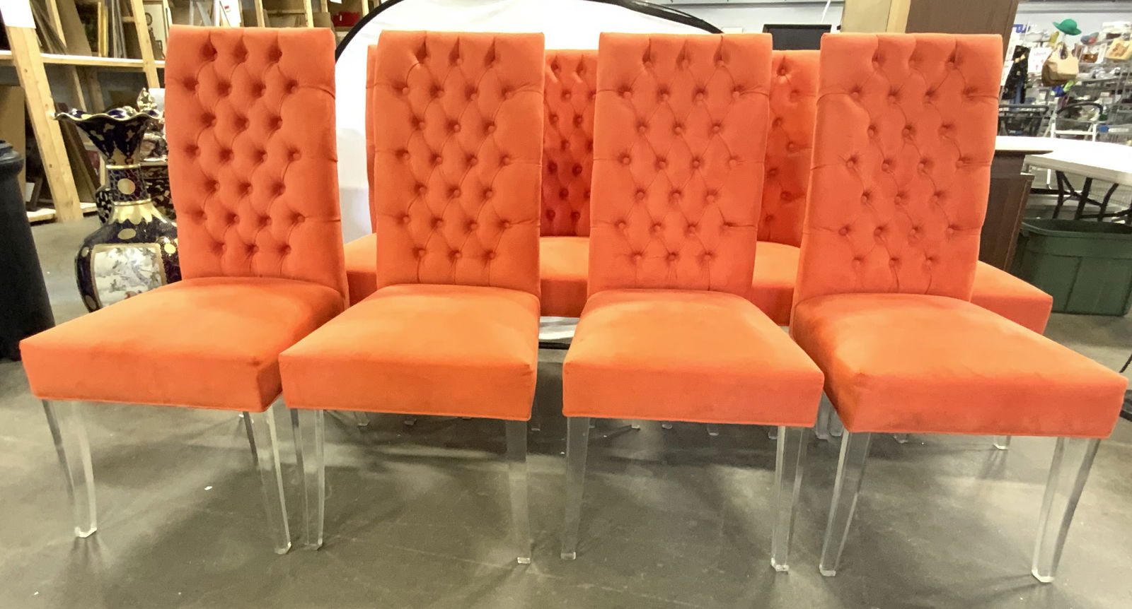 H STUDIO SHLOMI AZIZA Set 8 Dining Chrs: Tags on undersides read H STUDIO SHLOMI AZIZA. Design lush dining room chairs with orange ones tufted ultra suede upholstery. Each chair has acrylic legs. Each chair measures approximately 45 inches t