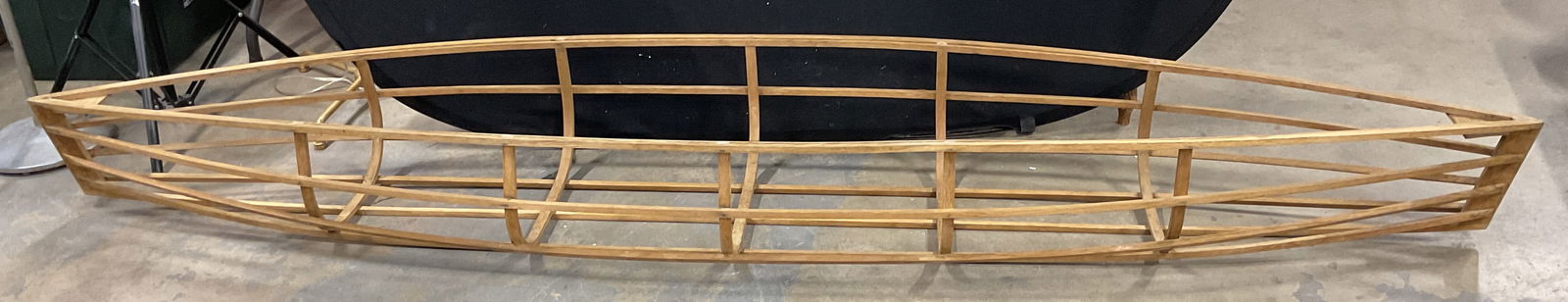 Wood Canoe / Kayak Frame, 9 Feet Long: Wood canoe or kayak frame. Skin on frame style boat. Measures approx 9 ft x 18 In x 11.5 inches. Some wear consistent with exposure. Canoe frame, kayak frame, skin on frame canoe, skin on frame
