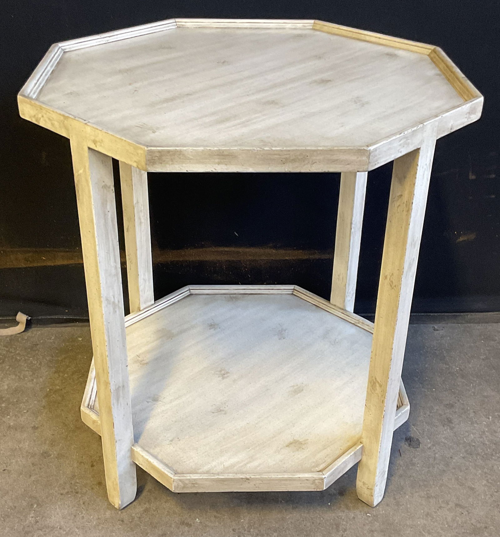 Modern White Wood Octagonal Side Table: Modern style white wood side table. Octagonal shaped with lower shelf. Measures approx 26 x 28 inches. Some scratching. Property of 69th Floor Hudson Yard Estate, Manhattan Table, side table, white
