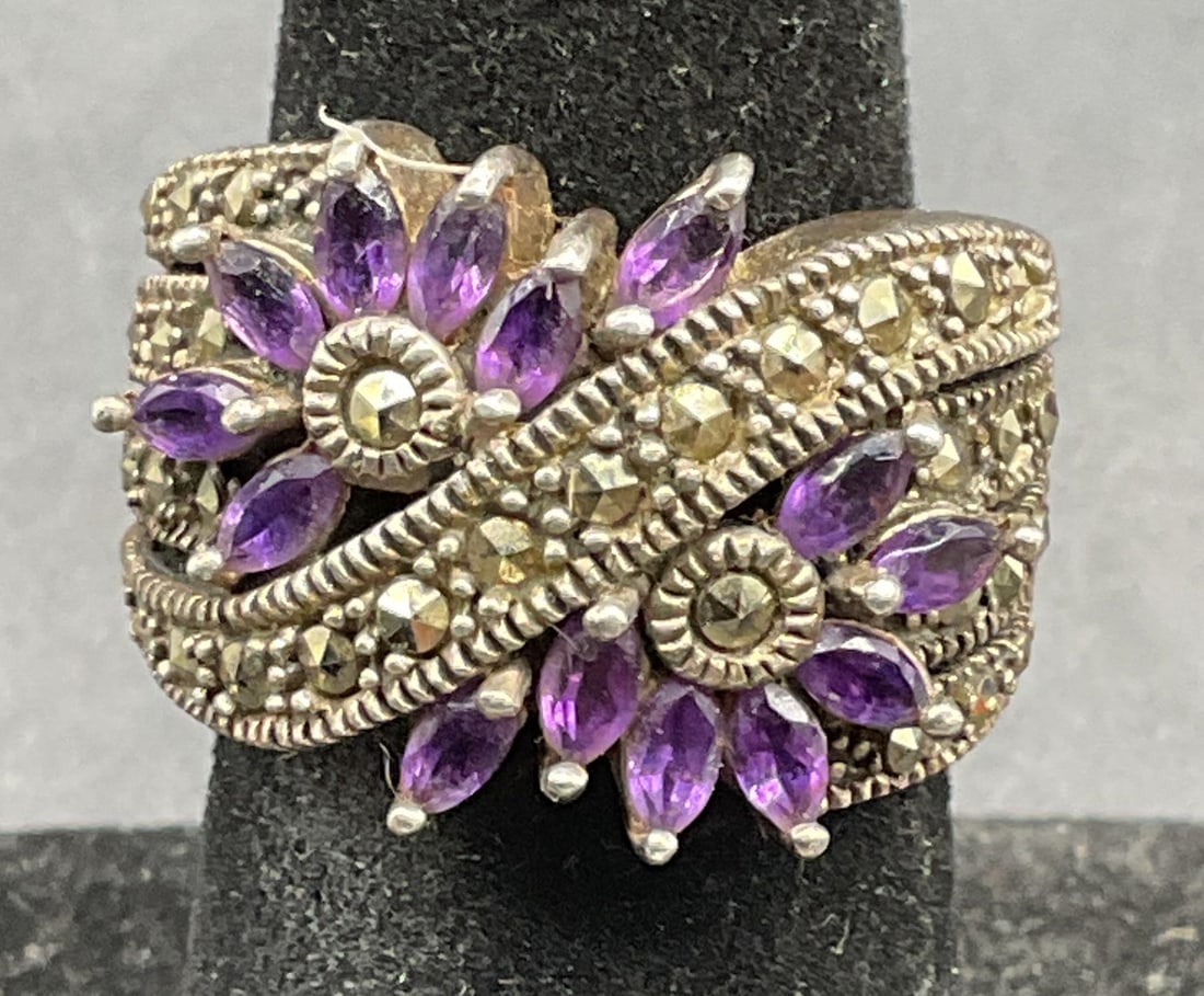 Signed NF Sterling Silver Semiprecious Ring: Signed NF Sterling silver ring with purple semiprecious stones, marcasite and flower design. Marked sterling. Ring size 5.5. Total weight 9.7 grams. Some scratching. Jewelry, estate jewelry, fine jewe