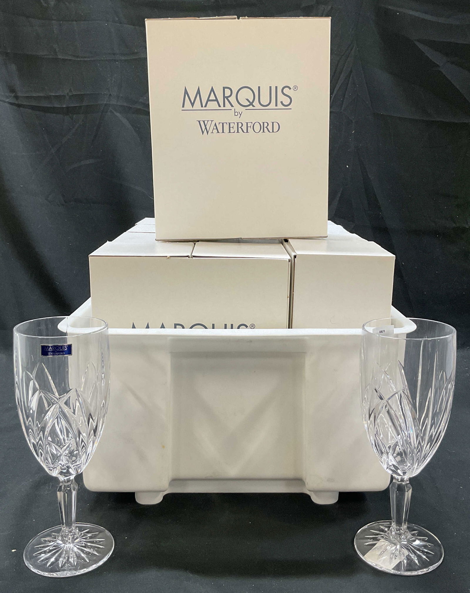 14 SGND Marquis By Waterford Stemware Germany NIB: New in boxes. Set of 14 Marquis by Waterford Brookside crystal iced tea goblets. Made in Germany. Signed Marquis by Waterford. 7 boxes come with two each. Brookside pattern. Intricate cuts and facets.