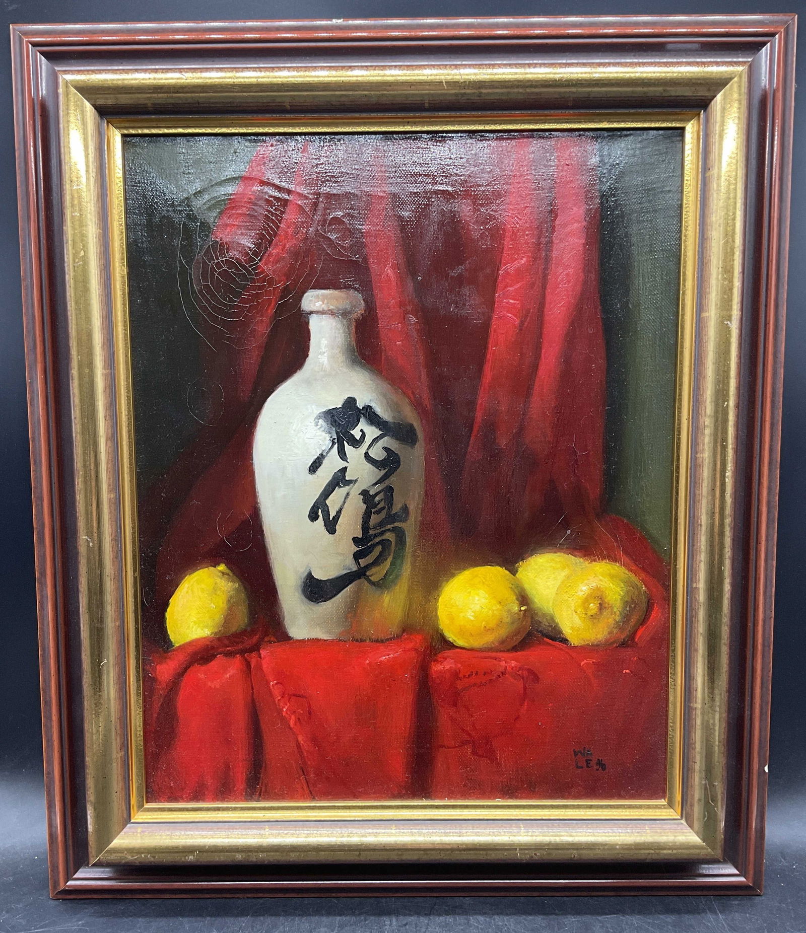 Signed Wa Le Still Life Lemon Oil Painting 1996: Framed oil on canvas painting. Signed and dated lower right, Wa Le 1996. Inscribed on verso stretcher bar WHHLEY. Still life with curtain, lemons, and Asian jug. Wood frame with gilt border. Not exami