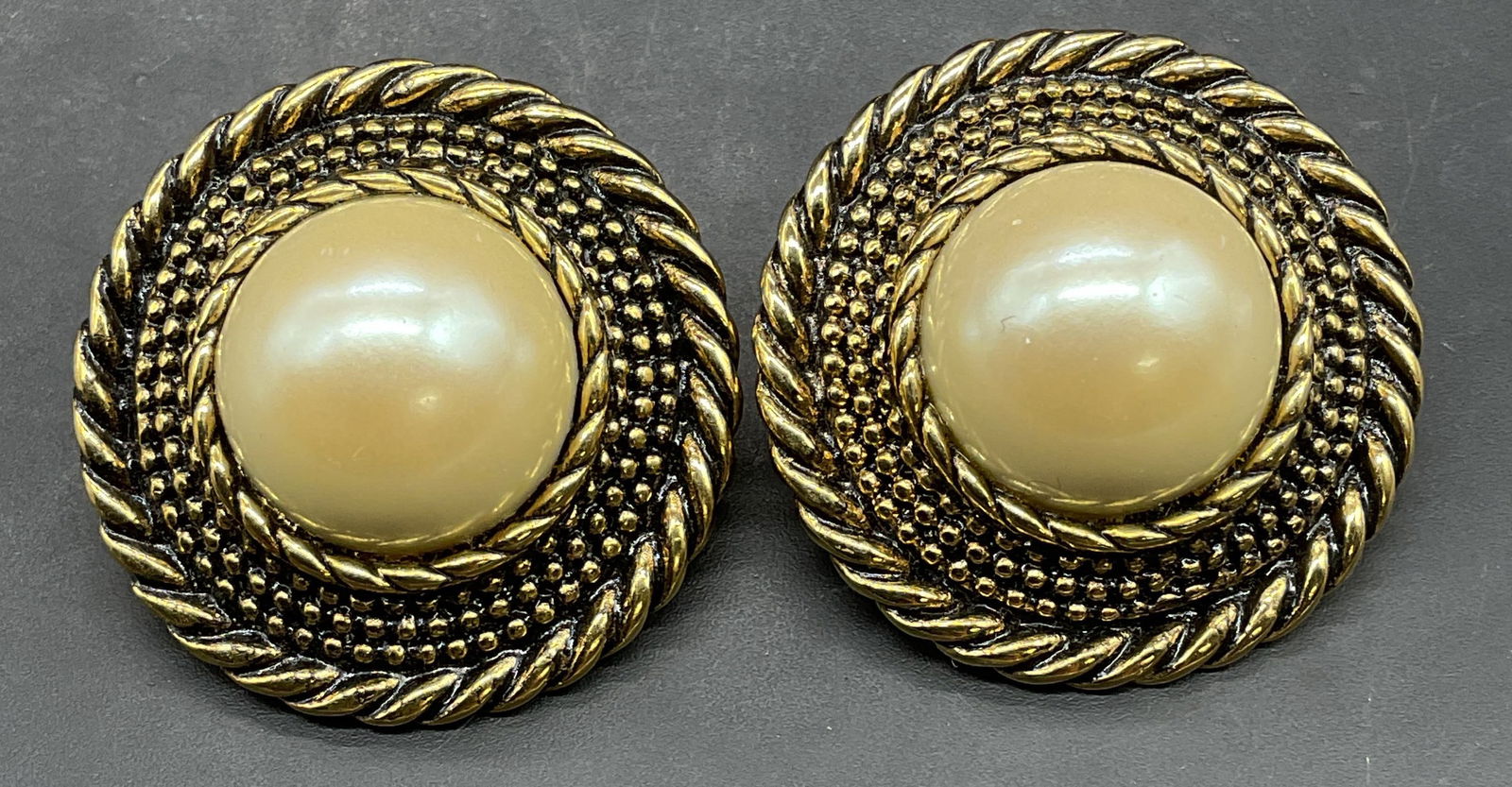 Vintage Gold Tone Faux Pearl Earrings: Vintage round gold tone faux pearl earrings. Measure approx 1.25 inches wide. Some scratching. Jewelry, estate jewelry, costume jewelry, cocktail jewelry, fashion jewelry, accessories, fashion accesso