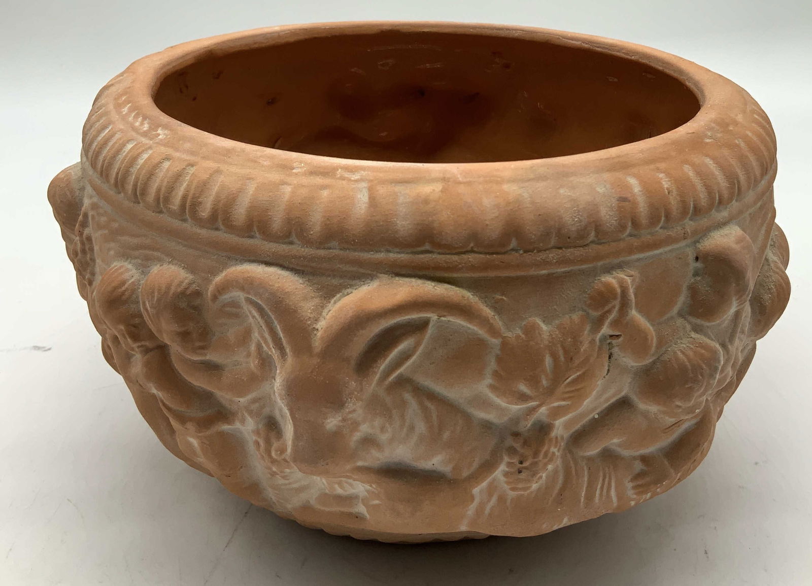 Vtg Raised Cherubs Figural Pottery Planter: Vintage pottery planter features a raised relief design of cherubs with grape cluster motifs & a rams head. Property of Upper East Side French stage and screen actors Estate, Manhattan. Surface wear c