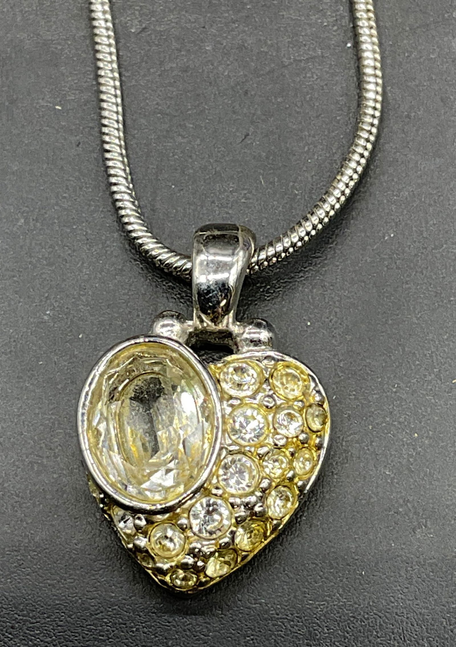 Swarovski Crystal Heart Pendant Necklace: Signed Swarovski silver tone heart pendant necklace with crystals. Drop length approx 8.5 inches. Chain needs untangling. Some scratching. Jewelry, estate jewelry, costume jewelry, cocktail jewelry, f