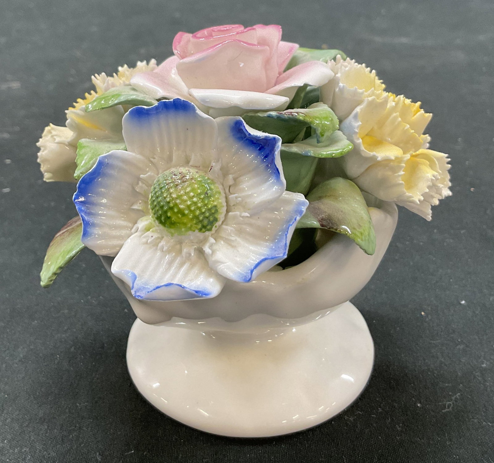 SGND Royale Stratford Flower Pot Figurine England: Signed Royale Stratford flower pot figurine. Made in England. Signed and marked on underside, reads as follows Royale Stratford Fine Bone China Handcrafted In Staffordshire England. Hand painted flora