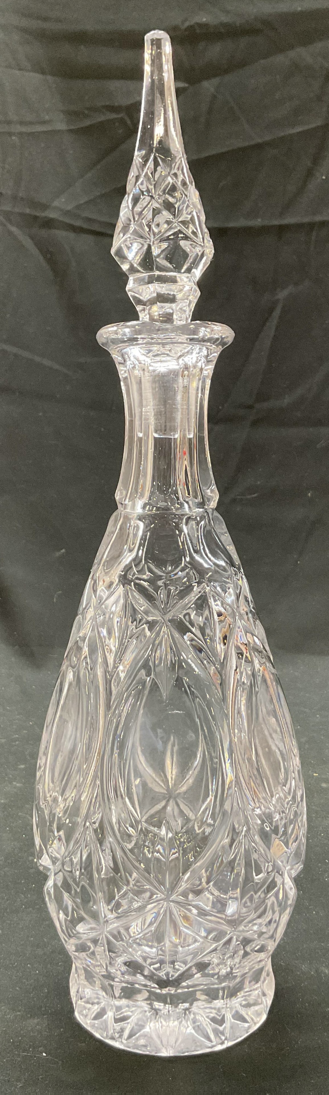 Vtg Princess House Decanter W Stopper Germany: Vintage Princess House cut crystal decanter. Made in West Germany. Comes with stopper. Flared narrow neck and round oval shaped body. Faceted design. Cut oval medallion and diamond pattern. Same desig