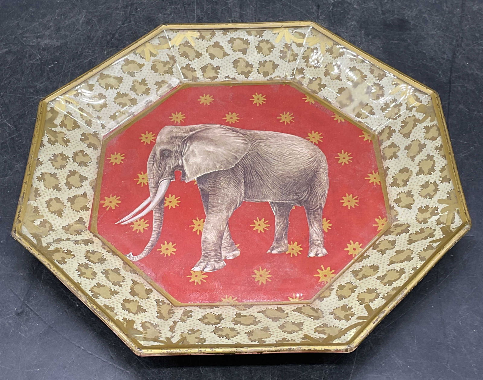 Moonlighting Interiors Decoupage Elephant Plate: Moonlighting Interiors octagonal glass decoupage elephant animal print plate. Measures approx 7.25 x 7.25 inches. Some scratching. Moonlighting interiors plate, elephant plate, animal plate, decoupage