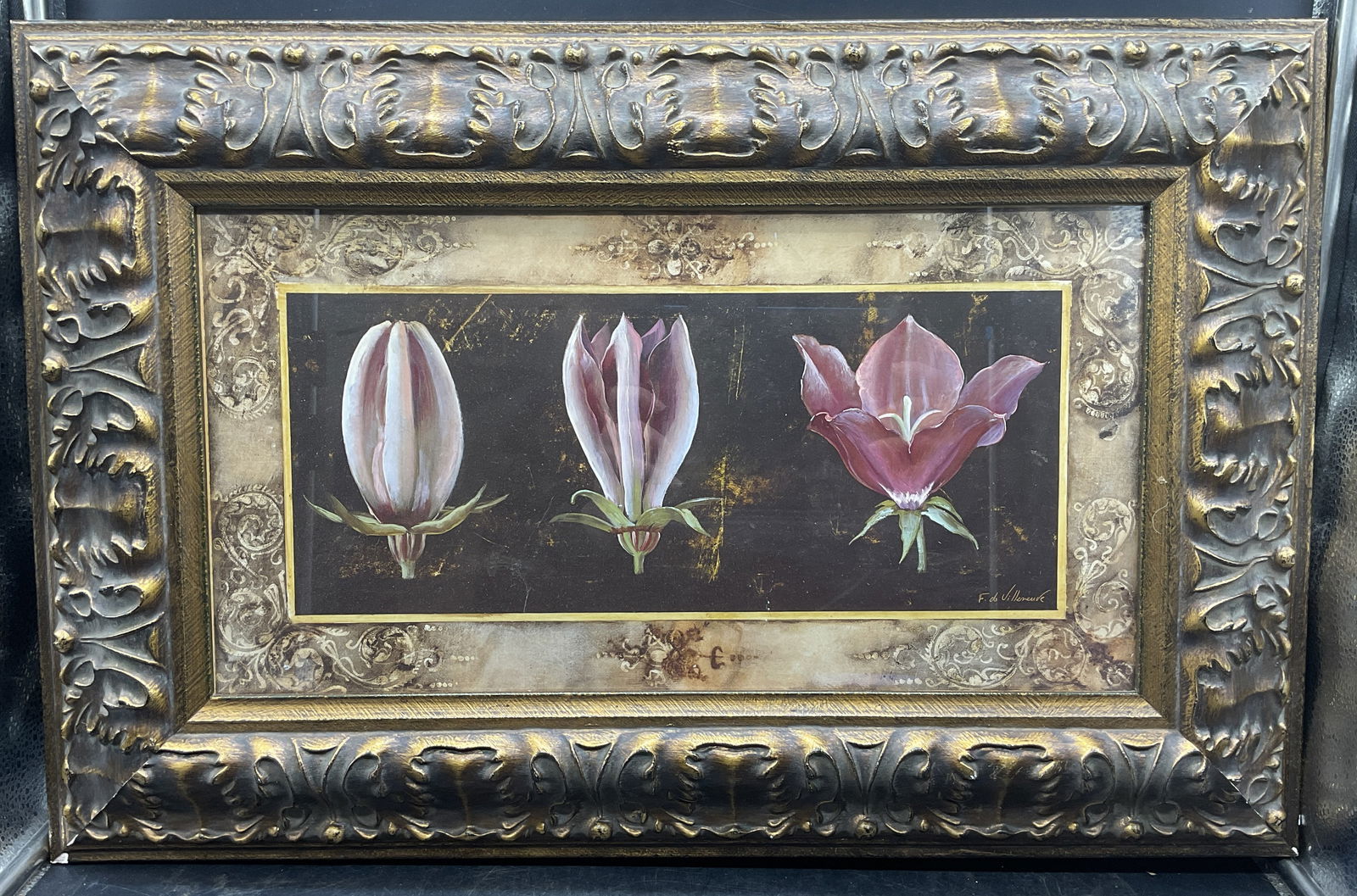 Gilt Framed Villeneuve Flowers Lithograph: Framed lithograph. Artist name printed lower right, F. De Villeneuve. Blooming flower. Ornate gilt wood frame. Not examined out of frame. Frame measures approx 16 x 24 inches. Some chips to frame. Art
