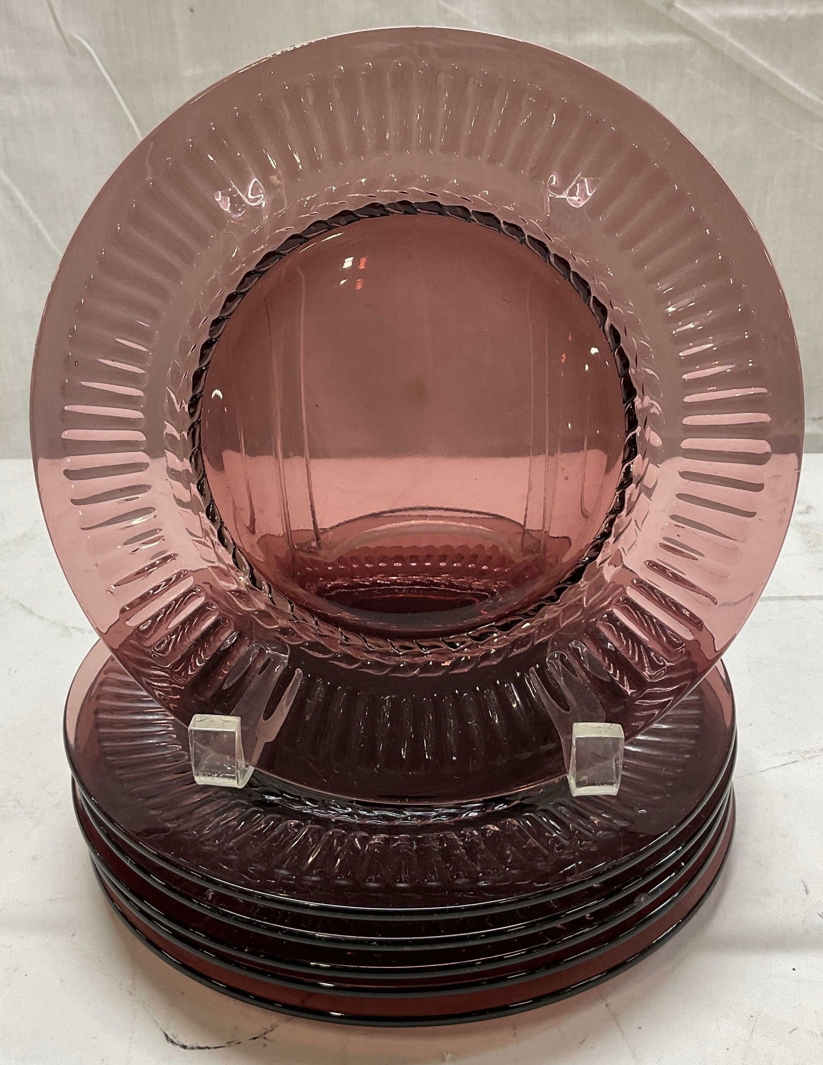 Set 6 Vintage Purple Depression Glass Plates: Set of 6 vintage purple depression glass plates. Ribbed border and leaf motif design. Circular plates. Measures approx 8 1/2 inches in diameter. Some scratching observed. Plates, depression glass, vin