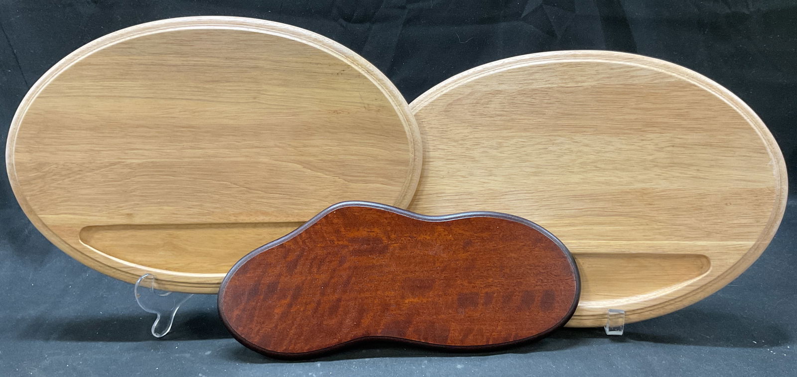 Lot 3 Dansk+ Wooden Cutting Boards NWT: Lot of 3 items. Two are Dansk wooden cutting boards. New with tag. Marked on underside, reads as follows Dansk International D Signs Ltd Malaysia IHQ. Oval shape with indentation. The other item is a