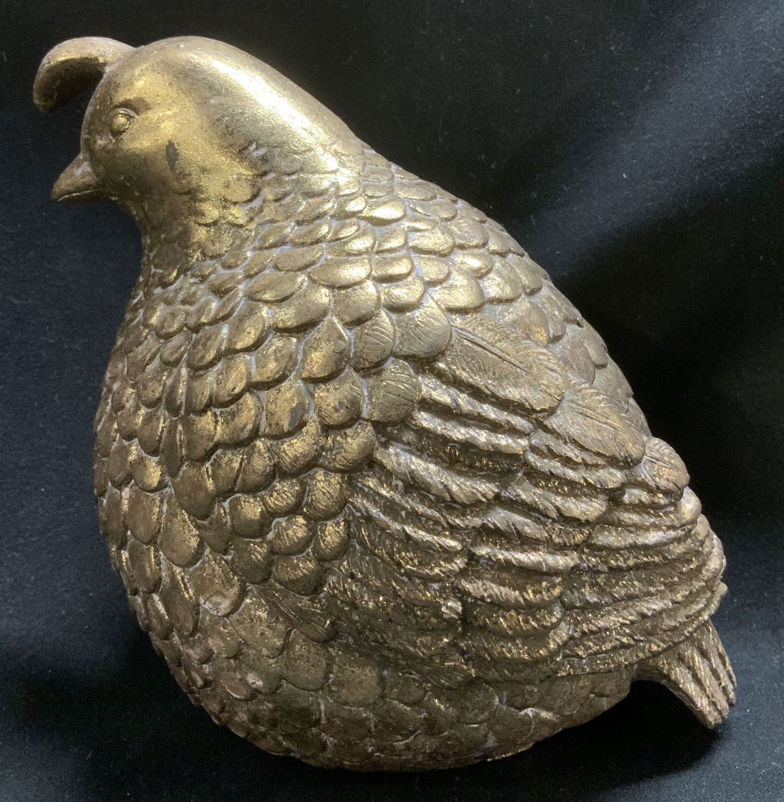 Gilt Quail Composite Figurine: Gilt quail figurine features detailed & intricate feather accents. Appears to be possible composite material. Surface wear consistent to age, use & exposure. Measurements: 5.2in x width 3.8in x height