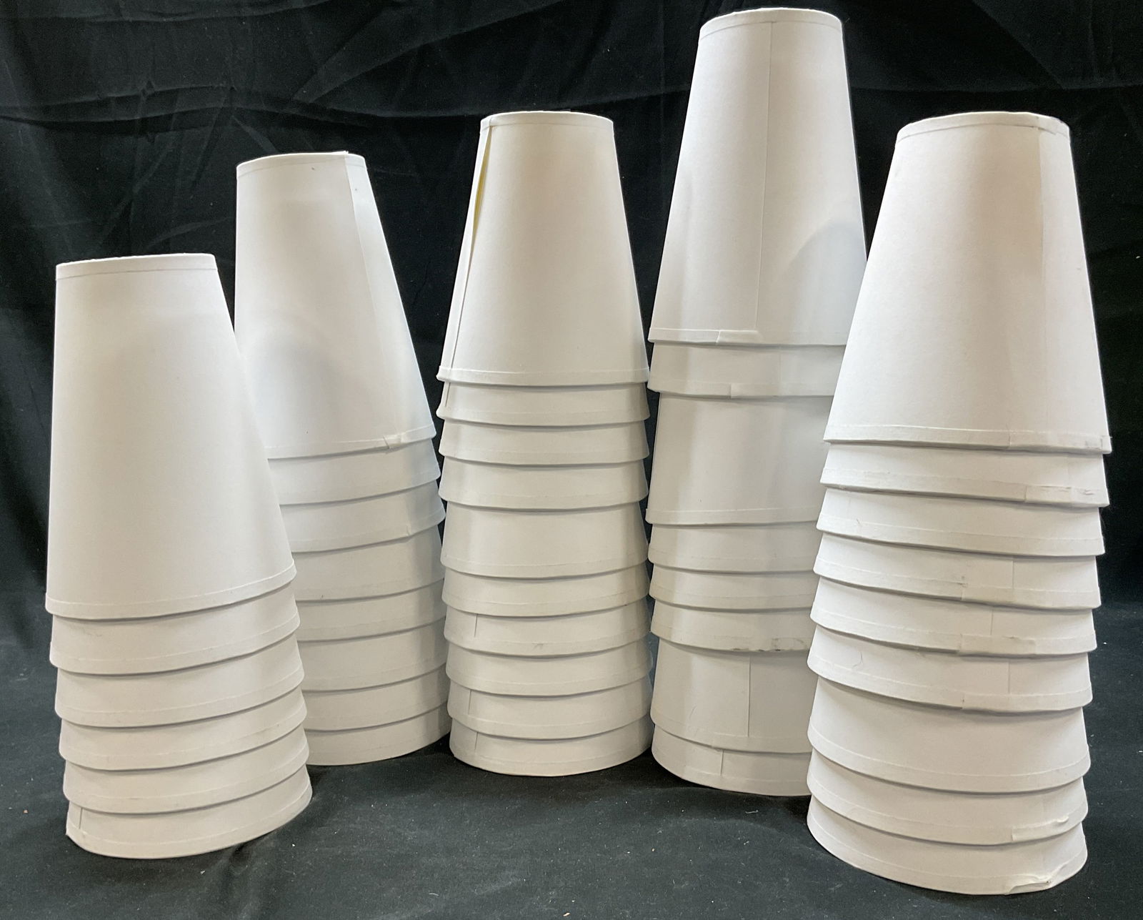 Set 41 Fenchel Shades White Paper Lamp Shades USA: Set of 41 Fenchel Shades white paper lamp shades. Made in USA. Sticker adhered to inside, reads as follows Made In The USA FenchelShades.com. Paper material with fabric trim. Comes in paper bag. Measu