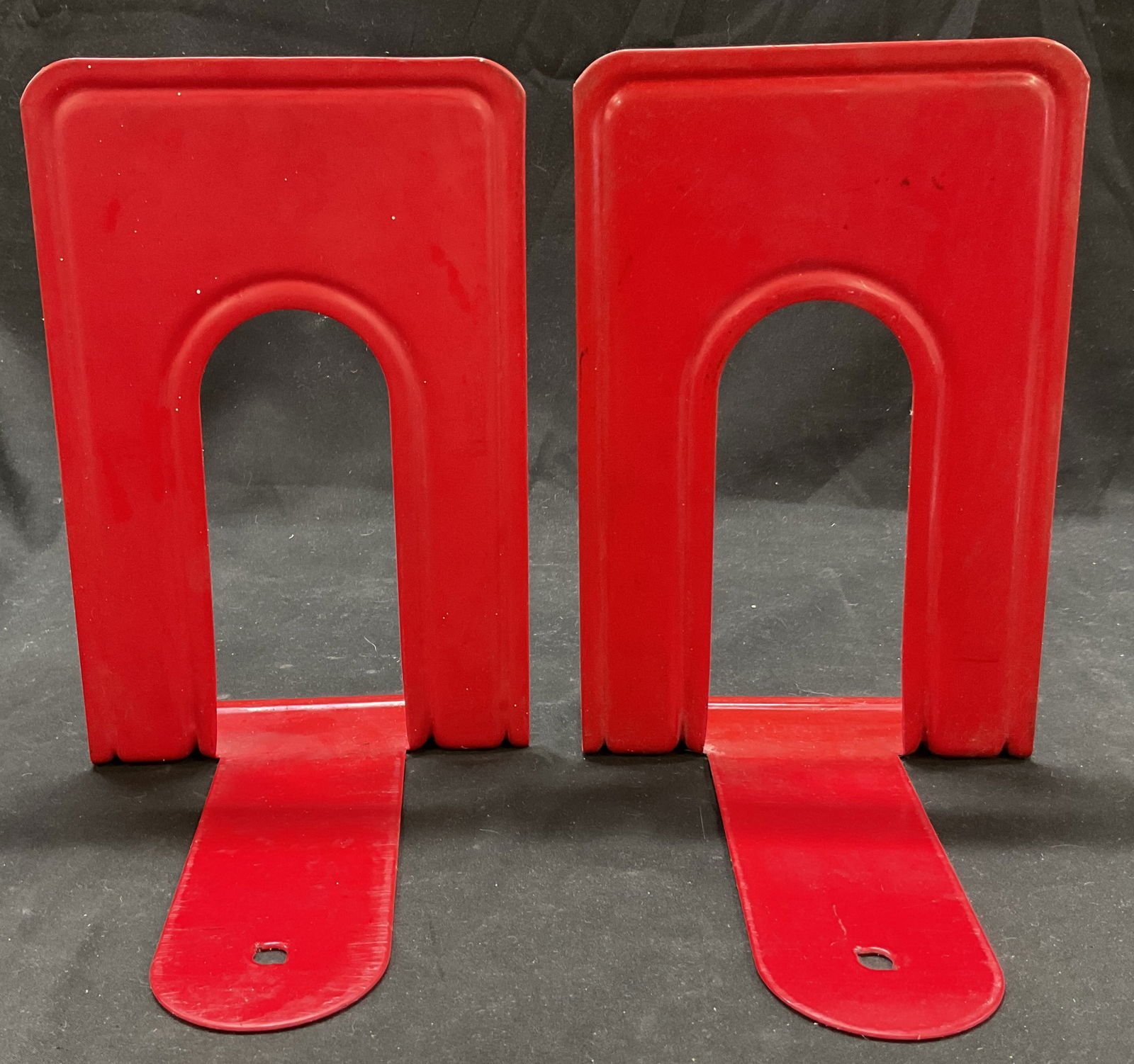 Vintage Highsmith & Co. Red Metal Bookends USA: Vintage Highsmith & Co. red metal bookends. Marked Highsmith & Co. Fort Atkinson Wis. Rectangular with arch shape. Measures approx 6 x 8 x 9 inches. Surface wear consistent with exposure. Property of