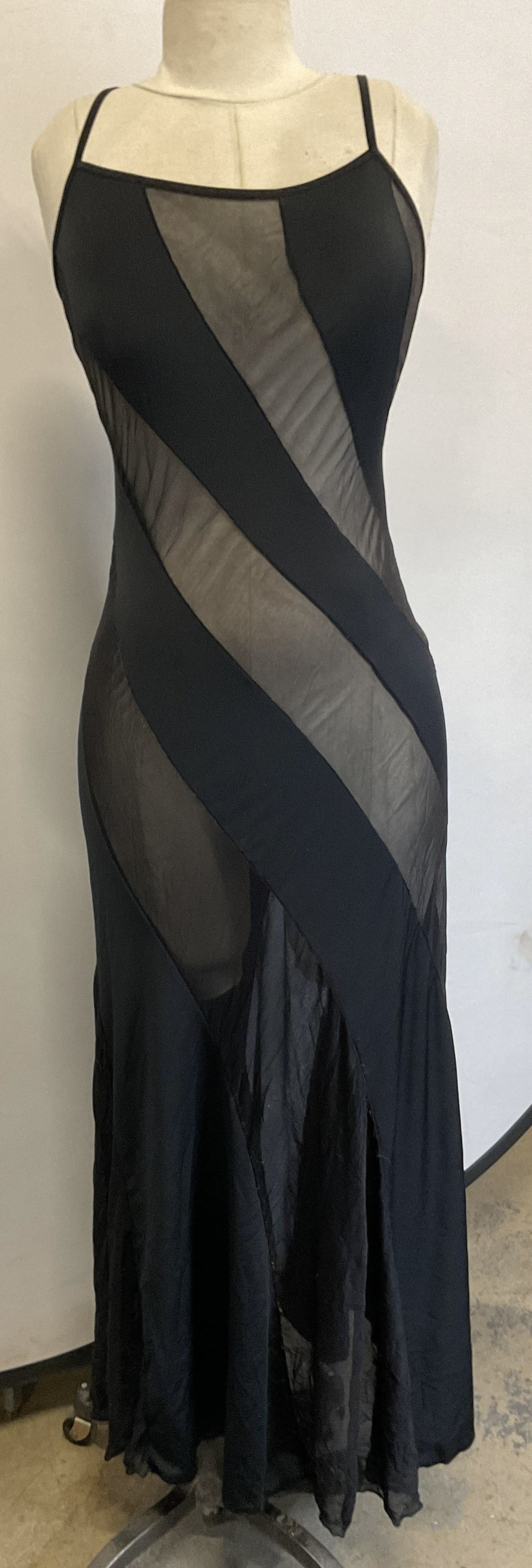 Fredericks Of Hollywood Black Lingerie Dress: Fredericks Of Hollywood black sheer lingerie dress. Measures approx 11 inches across chest. Feels like synthetic material. Striped like design. Some pull to stitching and wear consistent with exposure