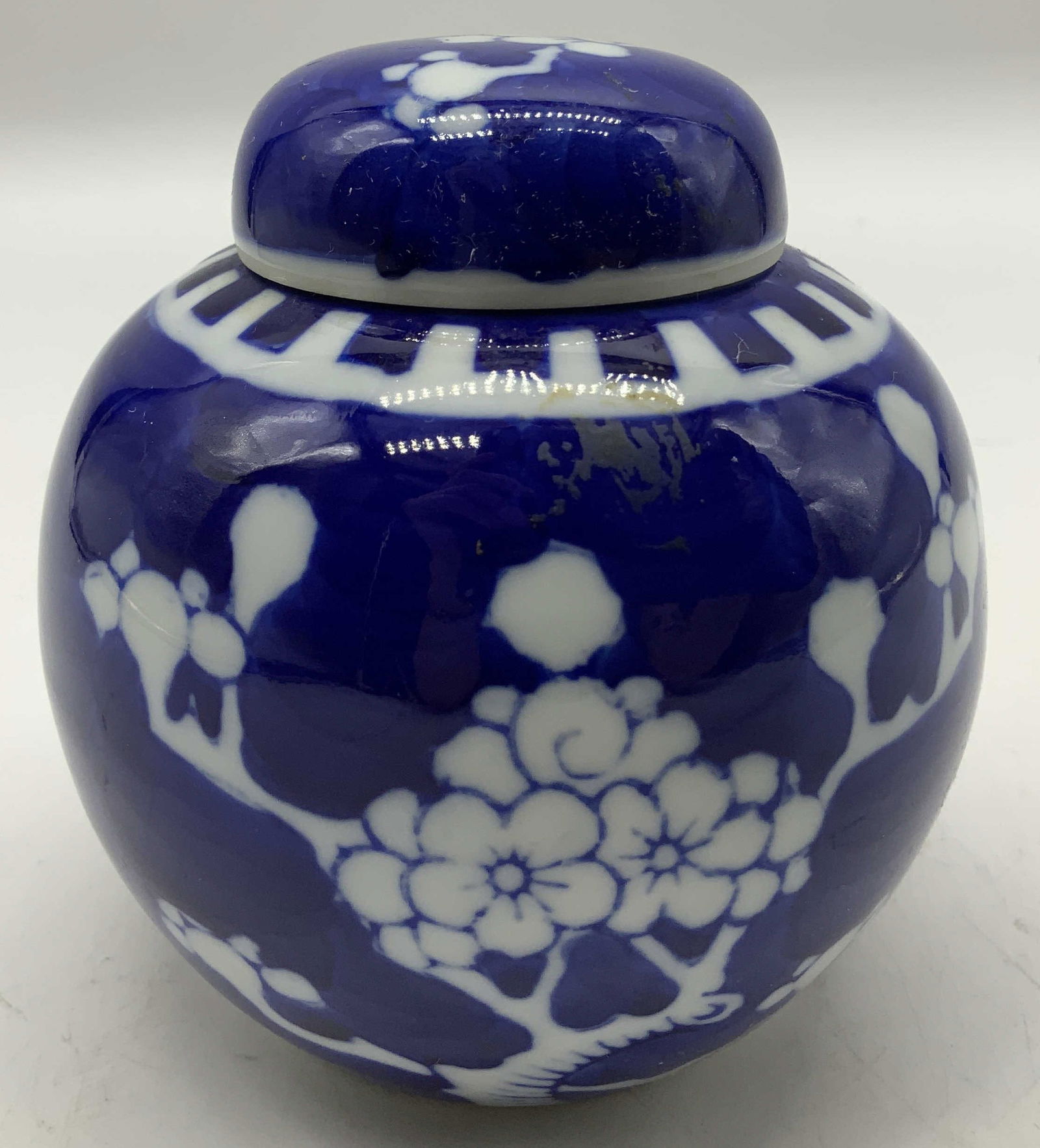 Vtg Asian Blue & White Prunus Ginger Jar: Vintage Asian blue & white porcelain ginger jar featuring a prunus blossom pattern. No visible signature or markings. Surface wear consistent to age, use & exposure. Measurements: length 3in x width 3