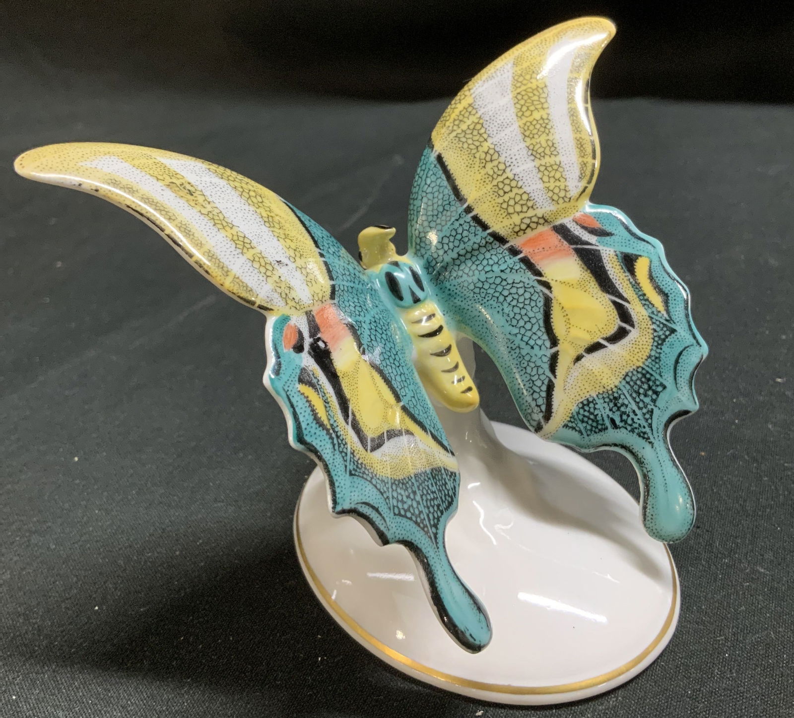 Vtg Rosenthal Hand Painted Butterfly Fig GERMANY: Vintage Rosenthal porcelain butterfly figurine with hand painted multicolored wings. Round porcelain base. Gilt accents. Signed & marked on underside. Reads, ROSENTHAL GERMANY. Surface wear consistent