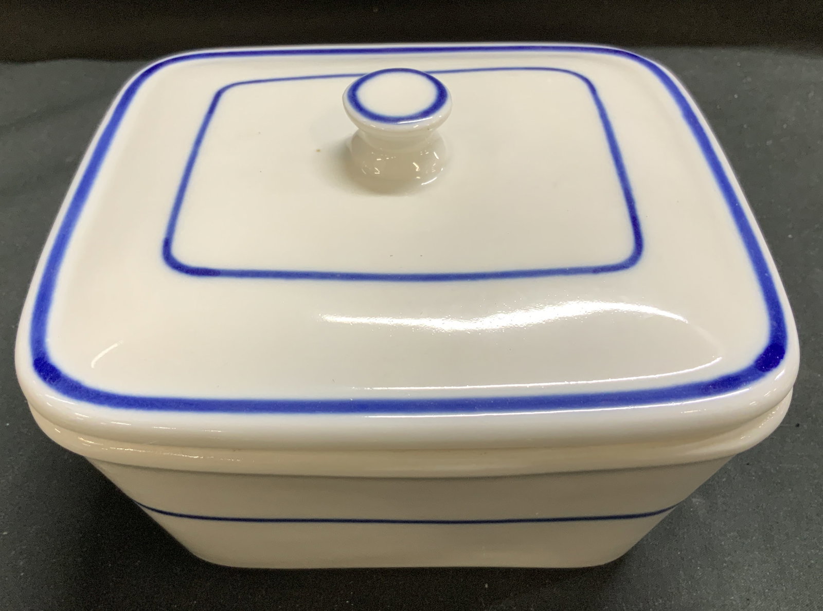 Viana Do Castelo Blue & White Canister PORTUGAL: Viana do Castelo Portugal hand-painted blue and white ceramic lidded canister. Signed & marked on underside. Reads, VIANA DO CASTELO. 318-F. MADE IN PORTUGAL. Surface wear consistent to age, use & exp