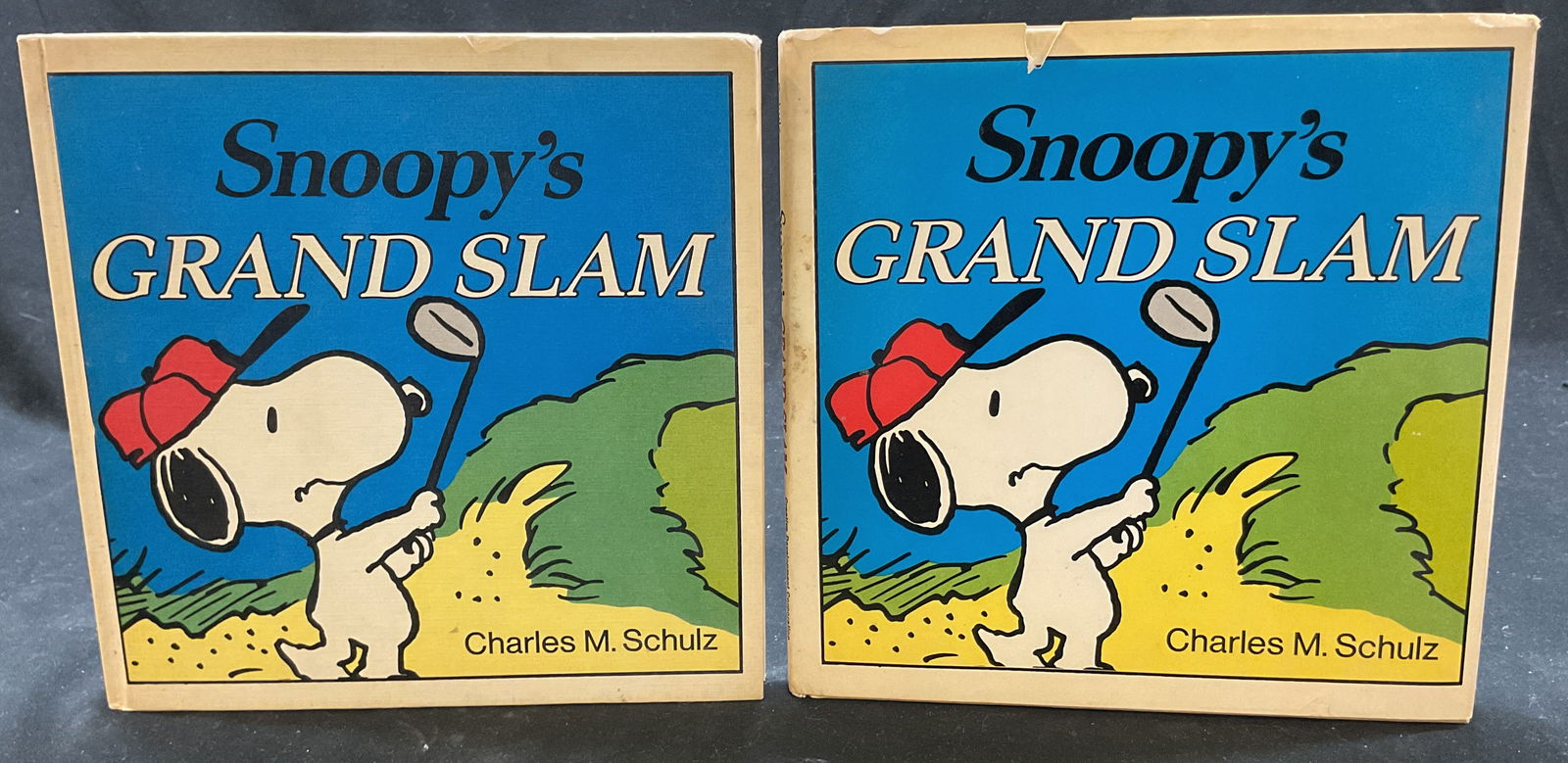 2 1st Ed Snoopys Grand Slam Illus Bk Schulz 1972: First edition book. Includes two copies of the same book. Hard cover book with illustrated book jacket, only one comes with a book jacket. Snoopys Grand Slam by Charles M. Schulz. Published by Holt, R