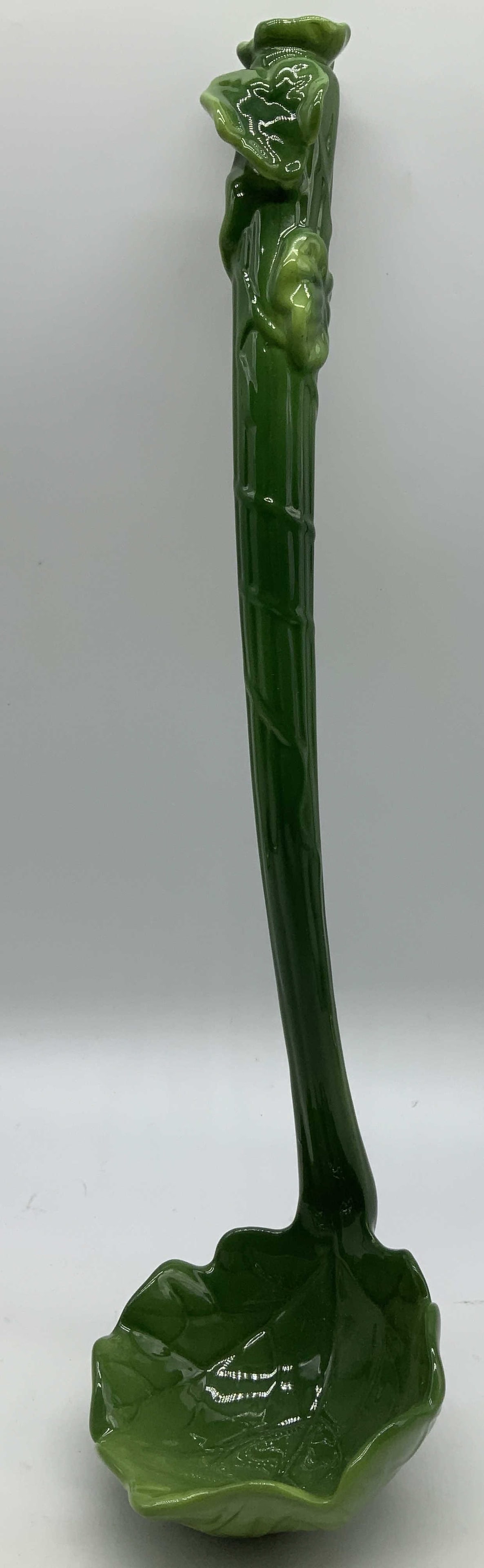 Vntg Green Glazed Cabbage Spoon Ladle: Vintage green ceramic cabbage style spoon ladle. Glossy finish & leaf motifs on handle. No visible signature or markings. Surface wear consistent to age, use & exposure. Measurements: length 13in
