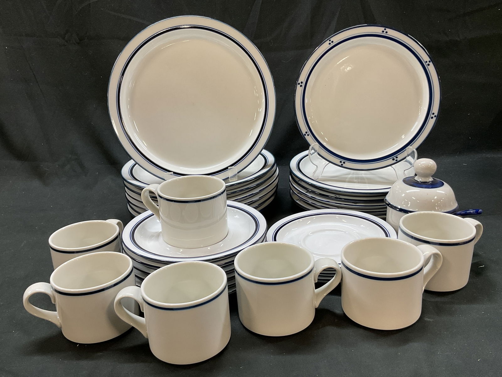 Set 32 Dansk Porcelain Tableware Japan Portugal: 32 piece Dansk porcelain tableware set. Marked on underside, reads as follows Dansk Bistro Dansk International Designs LTD NR Japan or Portugal. Includes 7 coffee mugs, 6 salad plates, 7 dinner plates