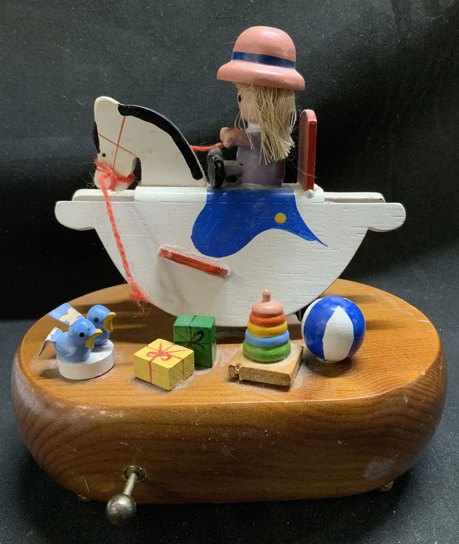 Vtg 1982 Schmid Rocking Horse Musical Box: 1982 Schmid musical box depicts a small girl on a white rocking horse with miniature toys on base. Wooden material. Signed & marked on underside. Reads, SCHMID MUSICAL COLLECTIBLES. 1982. Property of