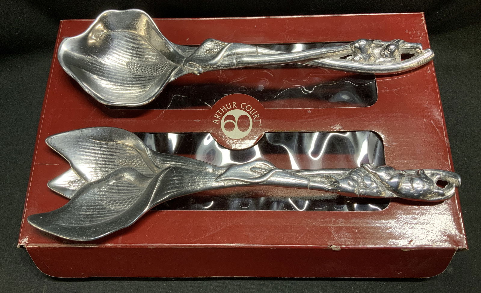 1991 Arthur Court Rabbits Salad Serving Set W Box: 1991 Arthur Court Calla Lily & Rabbits aluminum salad serving set. Comes with severing fork & spoon. Whimsical design of rabbits on handles. Come with original box. Signed & marked. Reads, COPYRIGHT 1