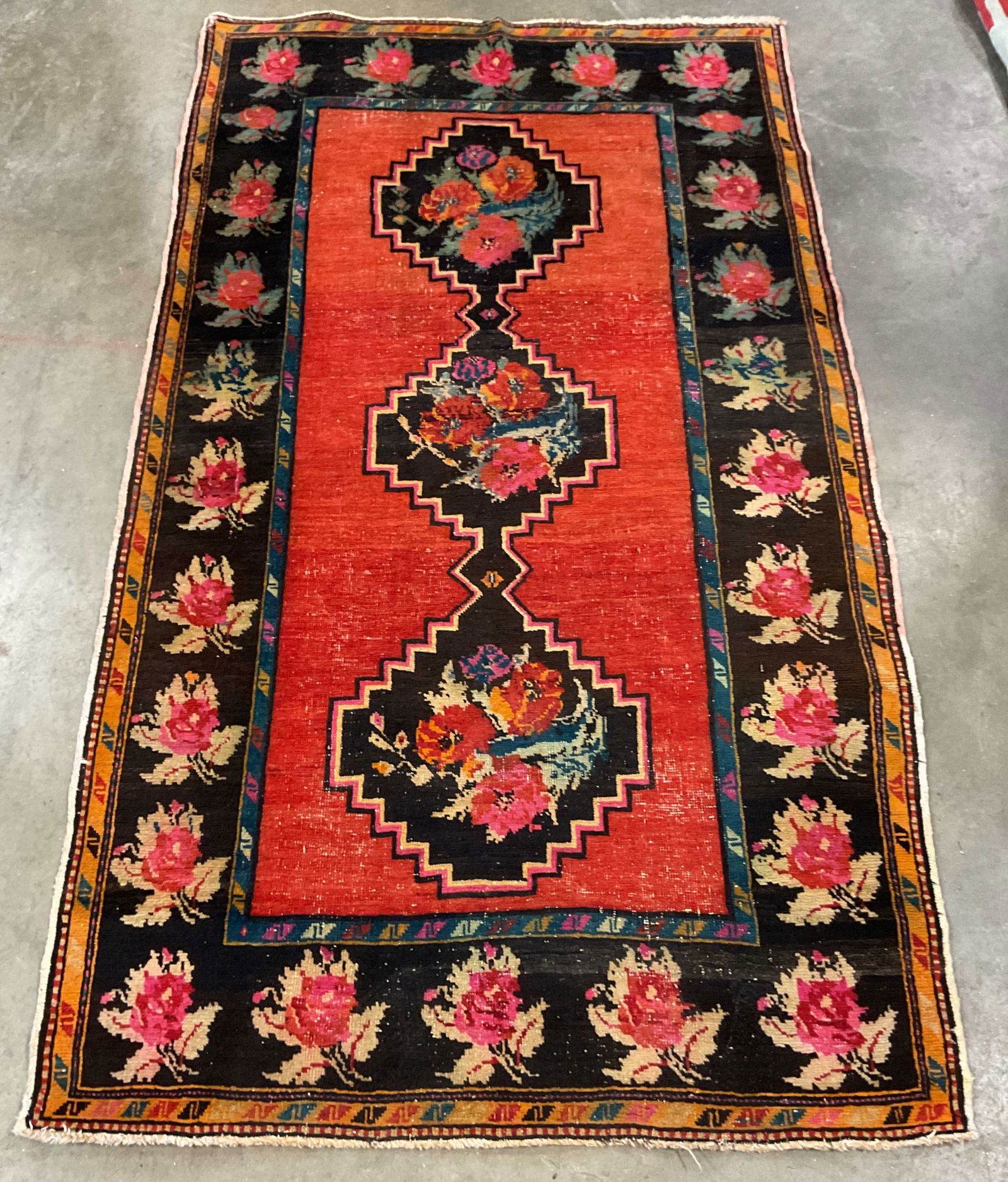 Antique Armenian Style Floral Wool Rug: Antique Armenian Karabagh style wool rug. Floral medallion pattern in black and red. Measures approx 90 x 52 inches. Wear including discoloration and losses. Armenian style rug, antique rug, rug, area