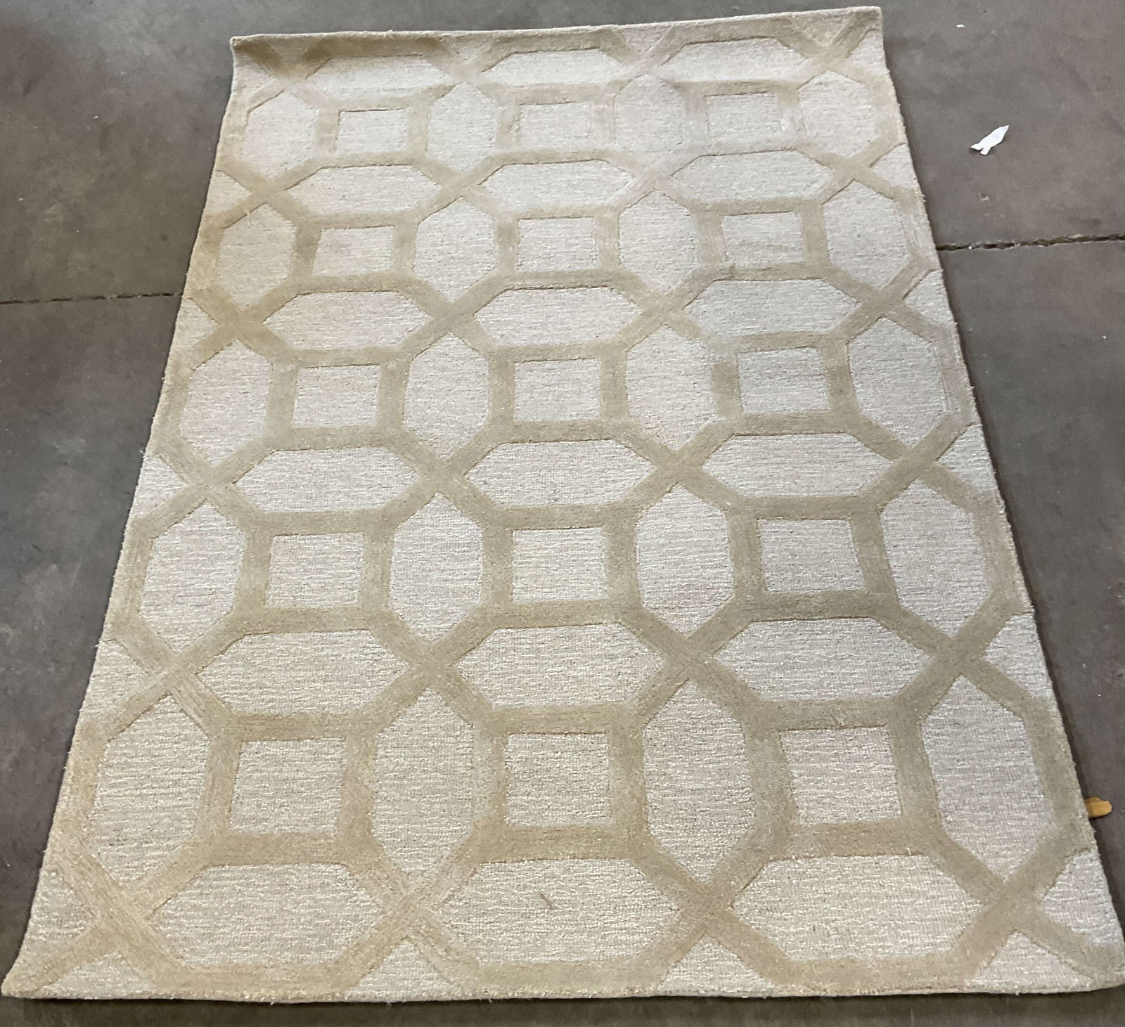 Artistic Weavers White Geometric Wool Rug: Signed Artistic Weavers white and cream wool and viscose geometric area rug. Measures approx 5 feet x 7 ft 6 inches. Some wear consistent with exposure. Artistic weavers rug, wool rug, white rug, geom