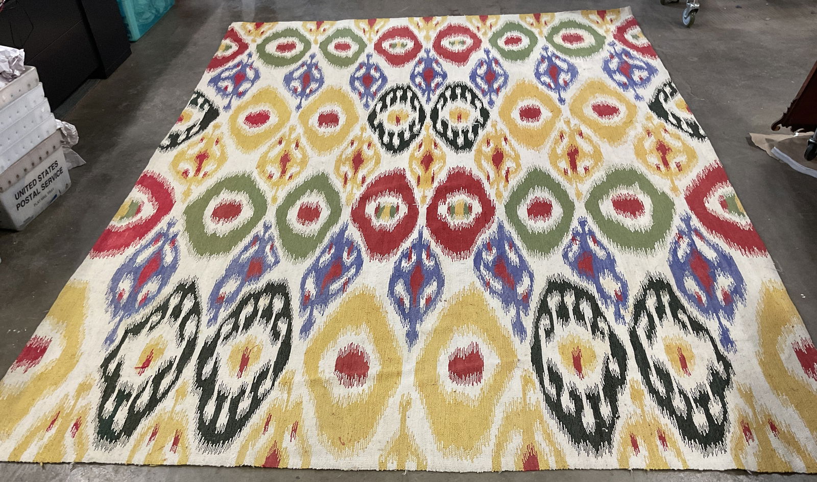 Hand Woven Ikat Yellow Green Rug: Hand woven wool rug, ikat pattern in yellow, red, and green. Measures approx 12 feet x 107 inches, wear including discoloration. Textile art, ikat rug, ikat tapestry, home decor, home accessories, rug