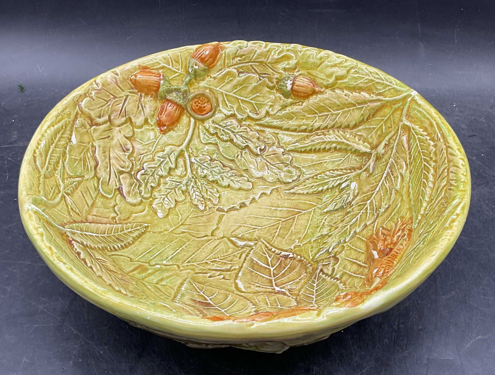 Vtg CASAFINA Oak Leaf Acorn Ceramic Bowl: Vintage signed CASAFINA ceramic bowl. Oak leaf and acorn pattern. Hand glazed green and brown. Measures approx 9.75 x 3.75 inches. Some chipping. CASAFINA bowl, ceramic bowl, green bowl, oak leaf bowl