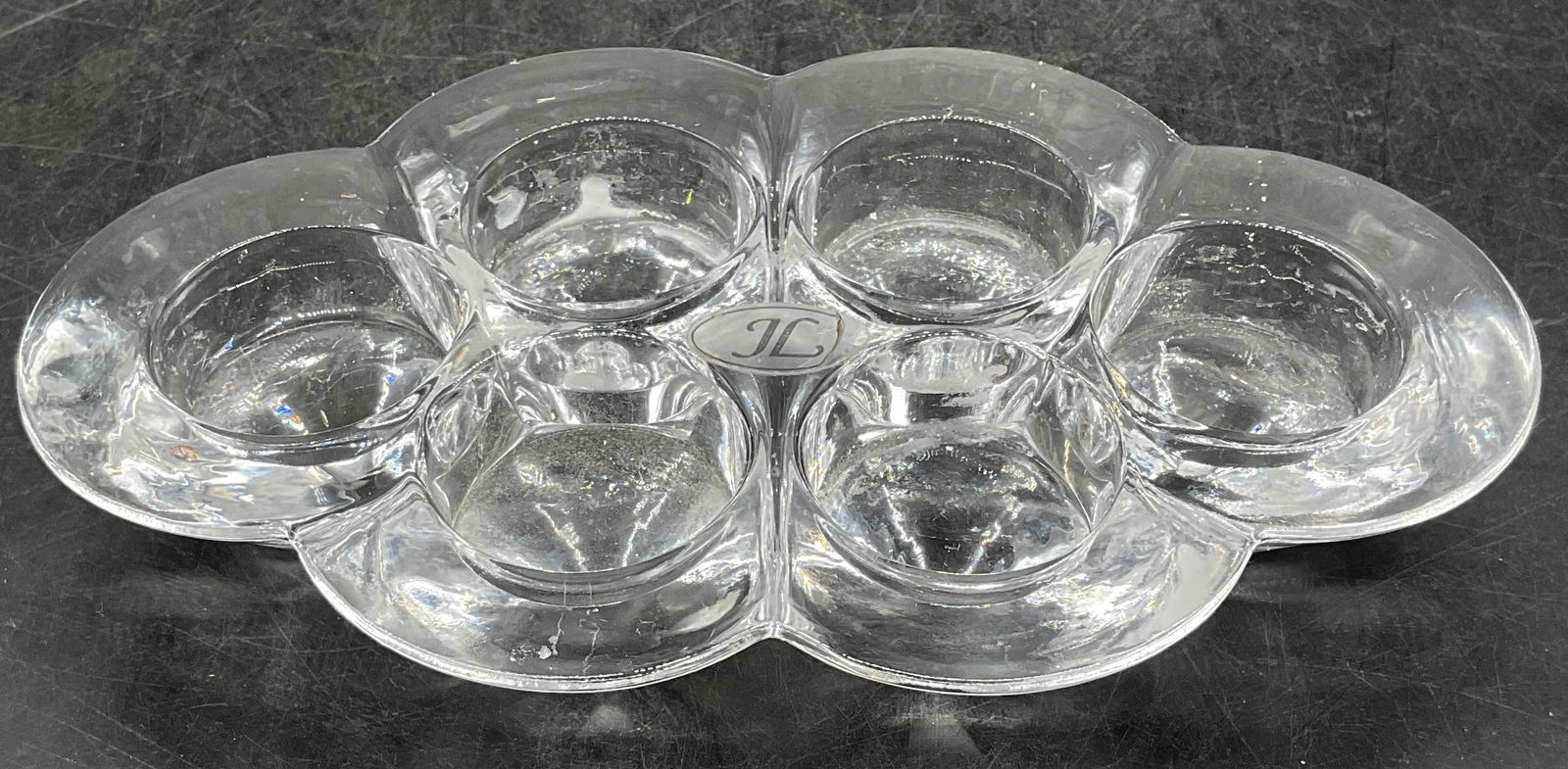 John Lewis Crystal Tea Light Votive Holder: Signed John Lewis JL Crystal 6 tea light votive candle holder. Pointed base with rounded design. Measures approx 8.25 x 5 x 2 inches. Some scratching. Property of opera singers estate from the renowne