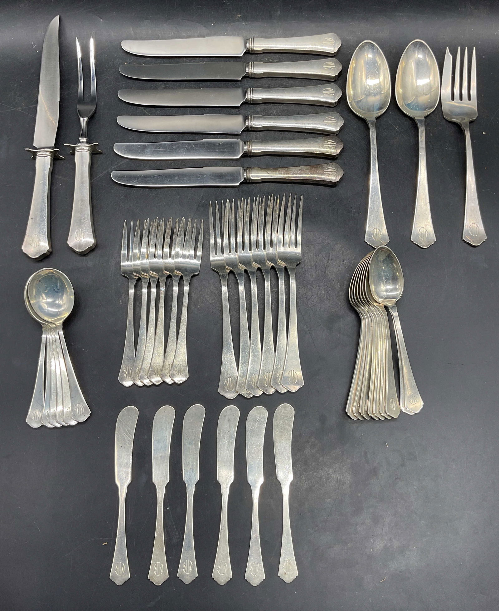 Set 44 Wallace Sterling Silver Service for 6: Set of 44 pieces vintage R Wallace & Sons sterling silverware. Knives, carving knife, and carving fork have stainless steel blades. Set includes carving knife and carving fork, 2 serving spoons, 1 ser