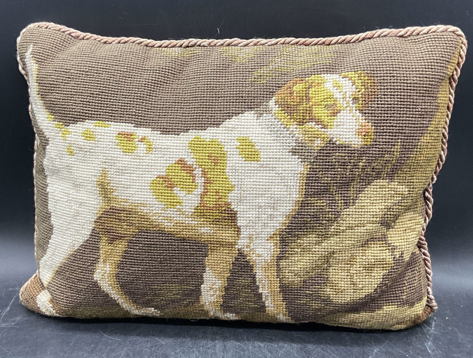 Vintage Katha Diddel Needlepoint Dog Pillow: Vintage signed Katha Diddel needlepoint dog pillow. Wool front and cotton backing. Measures approx 11 x 15.5 inches. Wear including discoloration. Katha diddel pillow, needlepoint pillow, dog pillow,