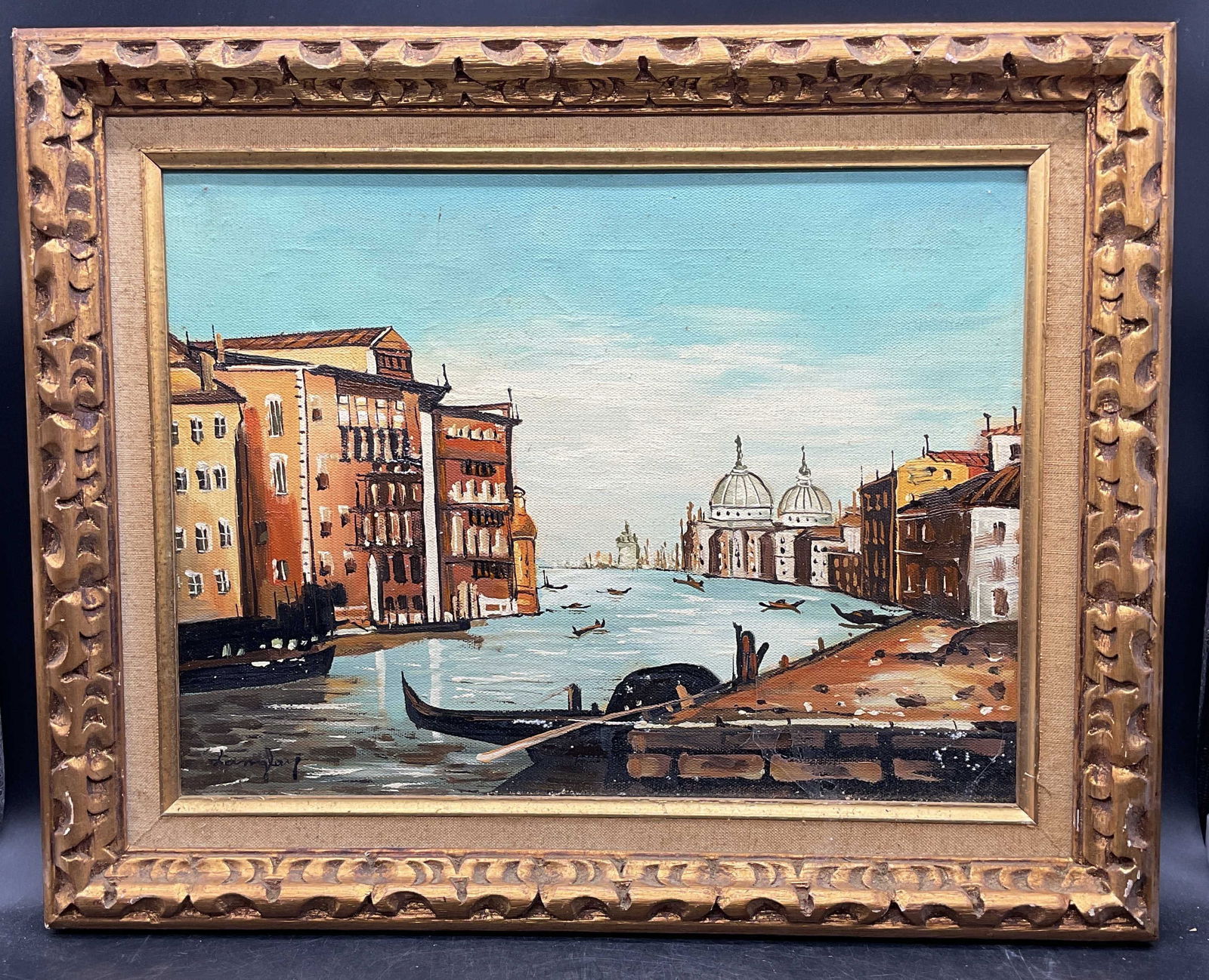 Signed Langley Venetian Scene Oil Painting: Framed oil on canvas painting. Signed lower left, Langlay. Venetian scene with view of water and architecture. Decorative gilt wood frame. Not examined out of frame. Frame measures approx. 16.25 x 20.