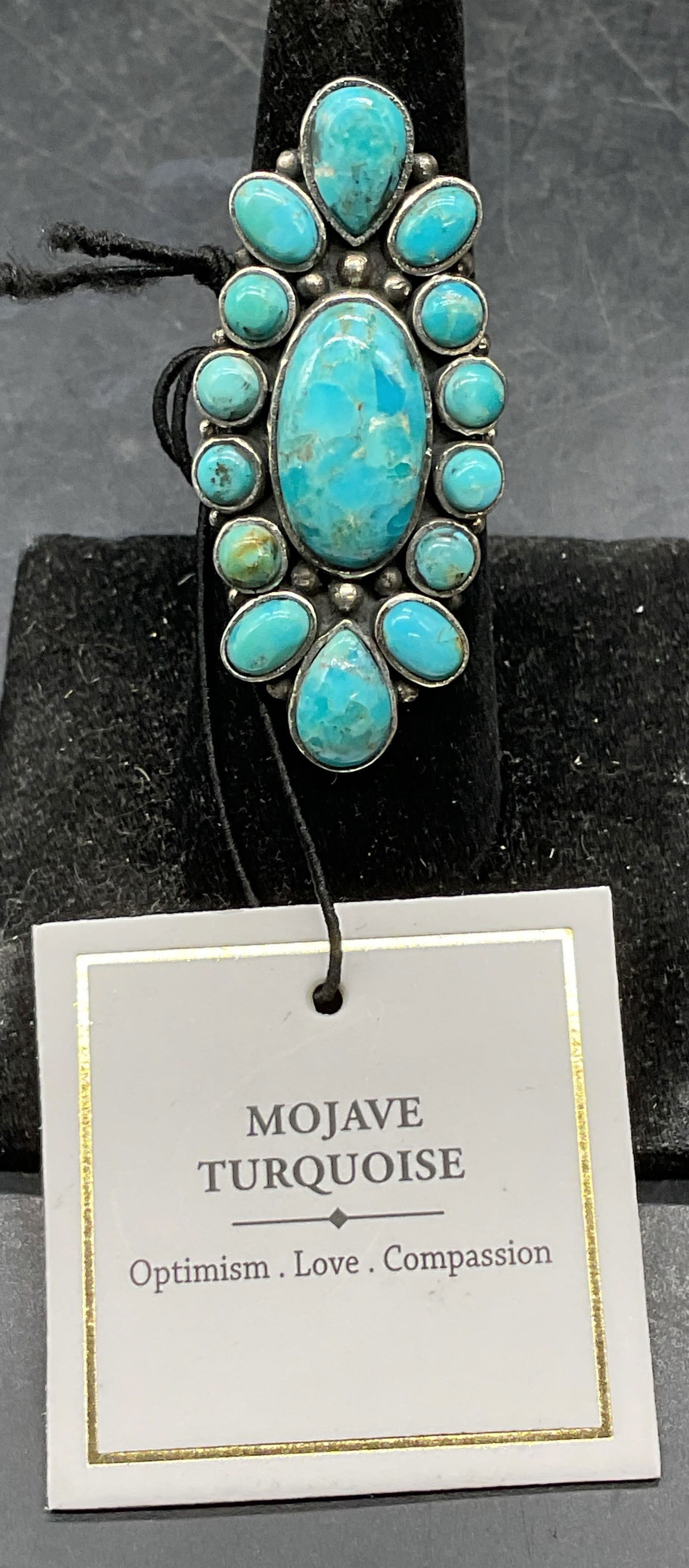 Sterling Silver Mojave Turquoise Ring NWT: Sterling silver ring with Mojave turquoise cabochons. Ring size 6.5. Marked sterling. Total weight 11.5 grams. New with tag. Some scratching. Jewelry, estate jewelry, fine jewelry, cocktail