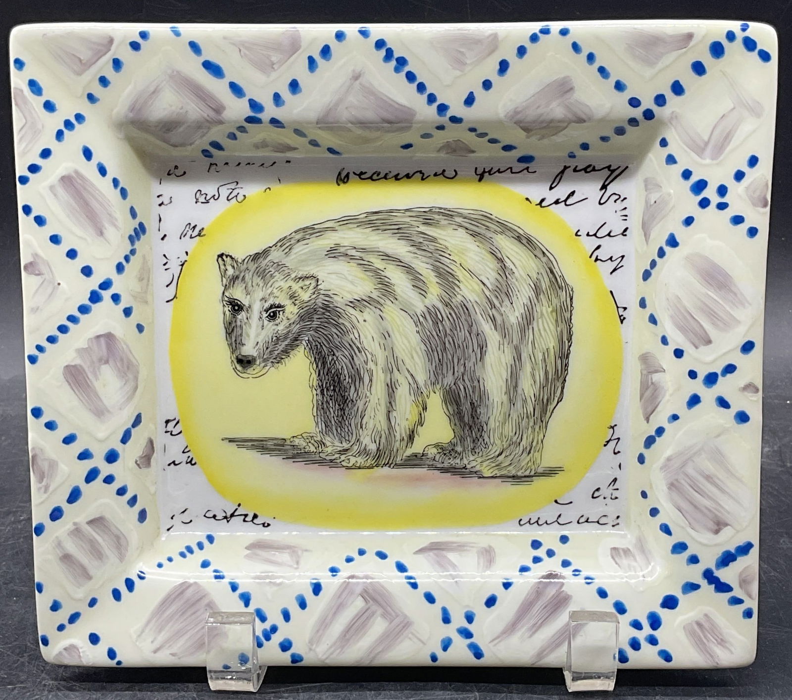 John DERIAN Hand Painted Bear Porcelain Plate: Signed John DERIAN for Tozai Home hand painted porcelain rectangular plate with bear motif. Measures approx. 7.75 x 6.75 inches. Plate has weight. Some scratching. John DERIAN plate, porcelain