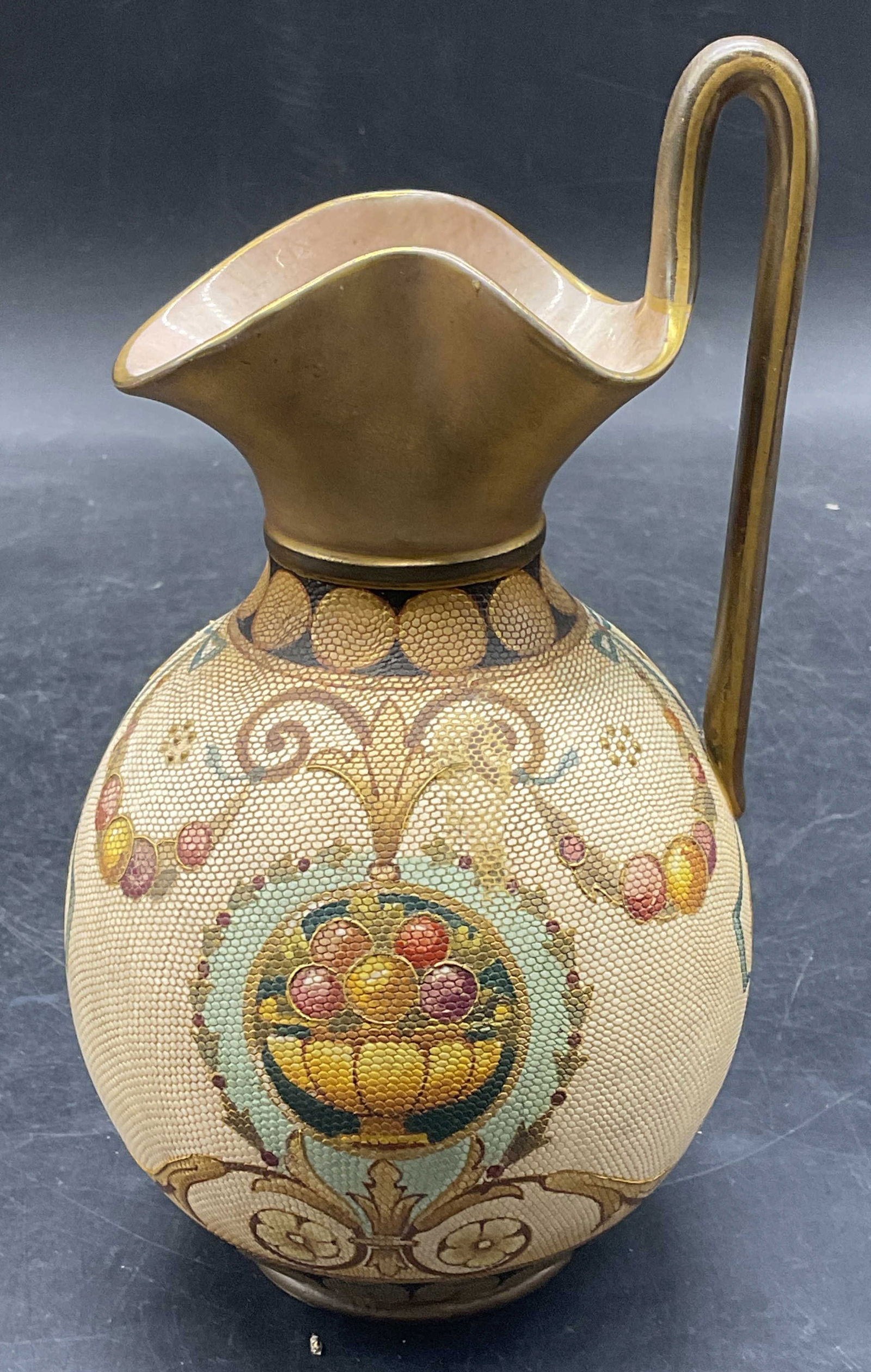 Antique Doulton Burslem Porcelain Pitcher: Antique signed Doulton Burslem porcelain pitcher. Hand painted raised tapestry or lace design with scroll and fruit pattern. Measures approx. 4 x 7.25 inches. Wear including loss to pigments, crazing.
