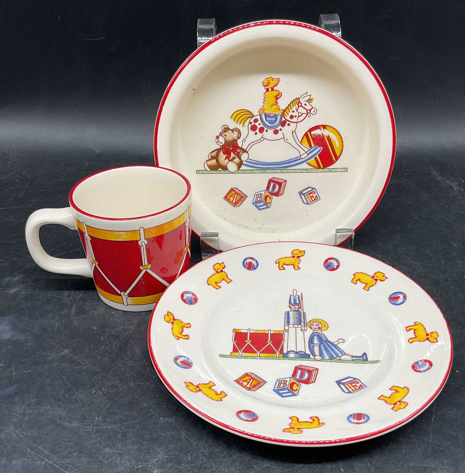 Set 3 Tiffany Toys Masons Ironstone Tableware: Set of 3 pieces vintage Tiffany & Co Tiffany Toys Masons ironstone childrens tableware. Bowl, plate, and cup. Toy pattern. Cup measures approx. 3 x 3 inches. Plate measures approx. 7 inches wide. Bowl