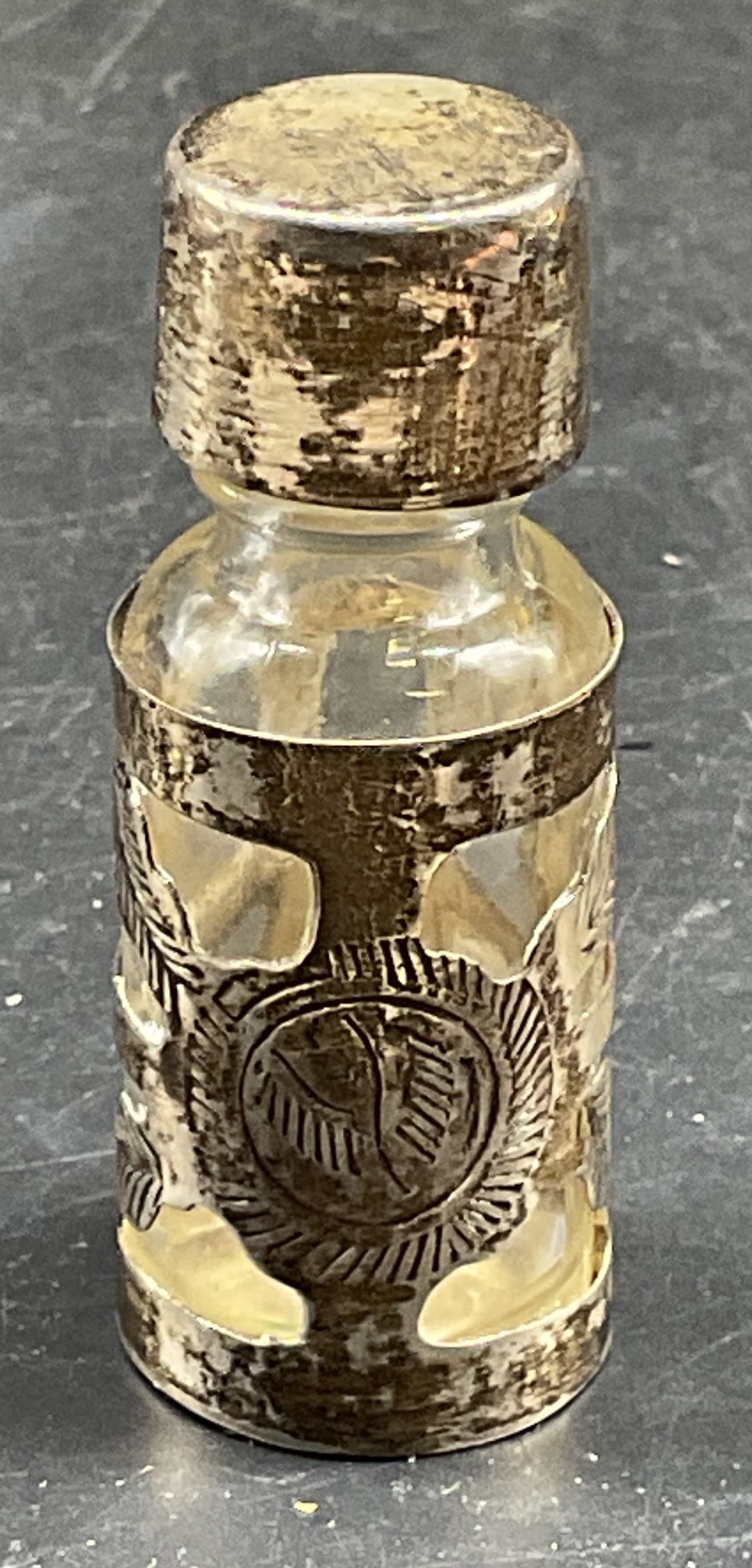 Vtg Sterling Silver Glass Perfume Bottle, Mexico: Vintage glass perfume bottle with sterling silver overlay. Signed illegibly. Made in Mexico. Marked sterling. Total weight 18 grams. Measures approx. .75 x 2 inches. Wear including patina and scratchi