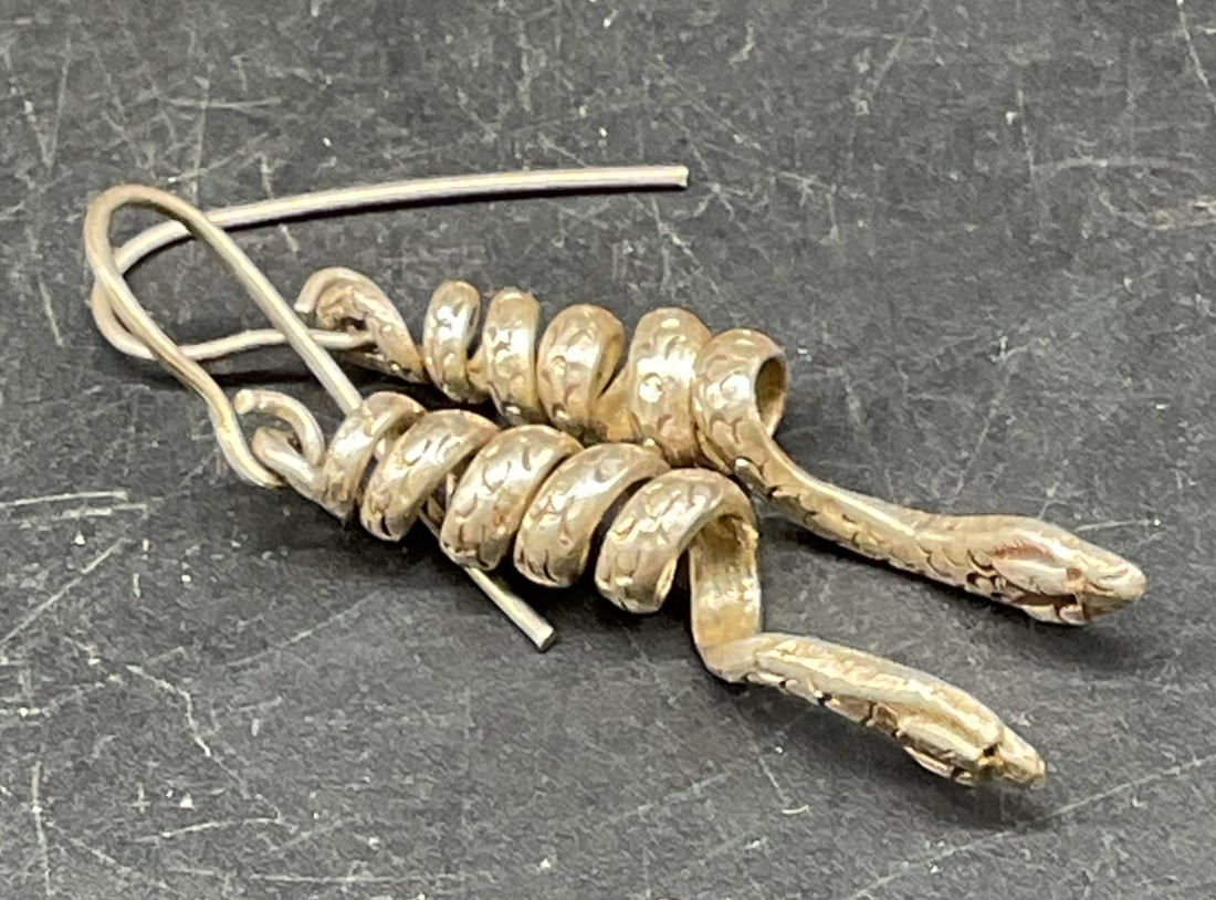 Vintage Sterling Silver Coiled Snake Earrings: Vintage sterling silver coiled snake motif earrings. Tested for sterling. Measures approx. 1.25 inches long. Total weight 4.2 grams. Some scratching. Jewelry, estate jewelry, fine jewelry, cocktail je