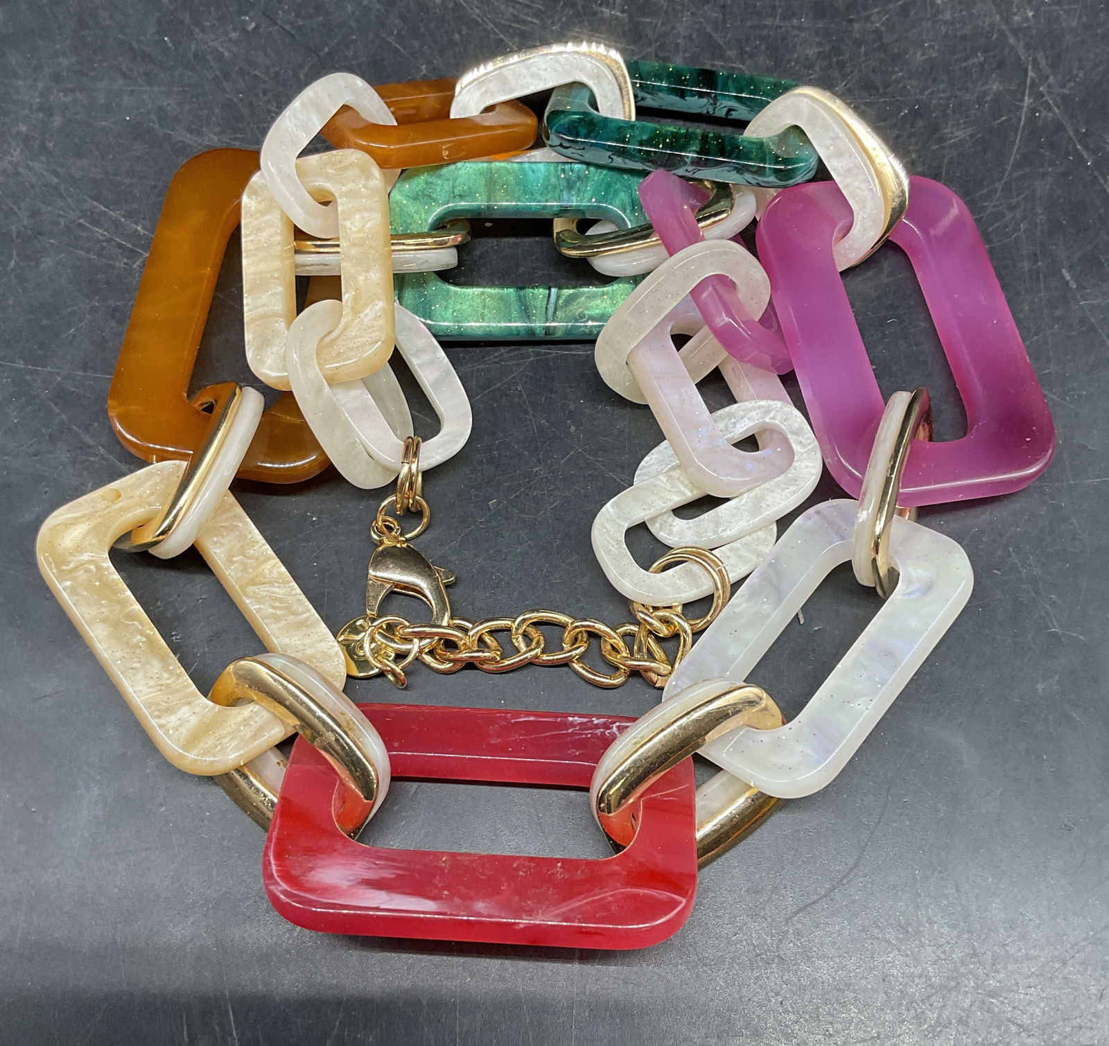 Signed Chunky Chain Lucite Necklace: Signed R multicolor chunky lucite chain link necklace with faux mother of pearl. Drop length approx 12 inches. Some scratching. Jewelry, estate jewelry, costume jewelry, cocktail jewelry, fashion jewe