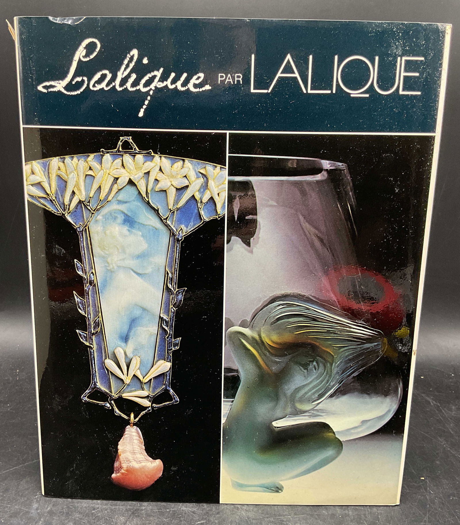 Signed Marie Claude Lalique, Lalique Par Lalique: Hardcover copy of Lalique Par Lalique by Marc and Marie Claude Lalique. Signed by Marie Claude Lalique on title page. Published by Edipop, 1983. Text in French and English. Illustrations in color and