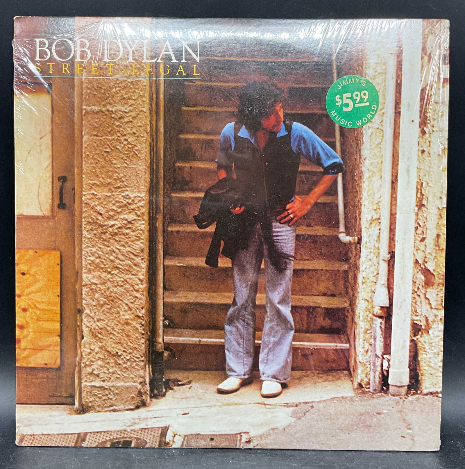 1978 Bob Dylan Street Legal 1st Pressing: 1978 first American pressing of Street Legal by Bob Dylan. Columbia Records. Catalog number JC 35453. Includes album sleeve, inner sleeve, and vinyl record. Sleeve measures approx. 12.5 x 12.25 inches